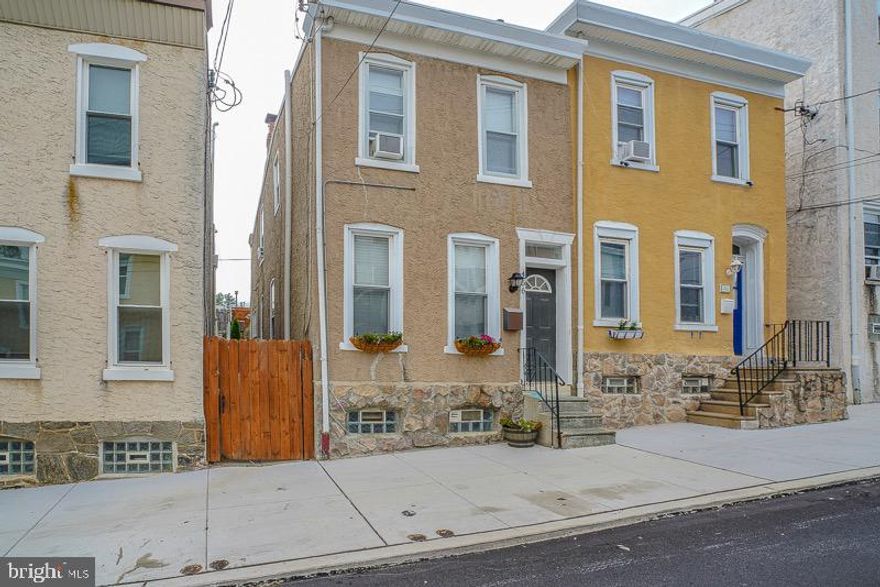 Welcome to 456 Krams Avenue, standing tall in the heart of Roxborough and the cusp of Manayunk! Consider entering into 1,440  square feet of modern high end finishes mixed gently with some old world charm - that's what you should expect at this lovely townhome now for sale! Enter into a generously sized living room with gleaming hardwood floors that flow nicely into the formal designated dining room! Take notice of the chair rail molding in the dining room! Continue through and you?ll be impressed by the size of the kitchen and all of counter space and details throughout! Beautifully shined countertops, white cabinetry and the subway tiled backsplash compliment one another perfectly! A beautiful mud room with even  more cabinet space is conveniently behind the kitchen which includes a powder room to finish out the first floor. Access to and from the fenced in deck and yard space can be accessed throw the mud room as well. Dine and entertain your family and closest friends here in this beautifully landscaped space! Beyond the fenced in yard, you will have the luxury of a parking lot you can use as your very own. Venture upstairs which includes new carpeting throughout, and find three bedrooms each with their own ceilings fans and enough closet for his and hers. The bedrooms and full hall bathroom all display the same quality upgrades and modern vibes as the rest of the home! Downstairs is a full sized basement adequate for the rest of your storage as well all of your laundry and cleaning needs; utilizing a brand new washer. This beautiful home is situated right near Gorgas Park, all the shops and eateries along Ridge & Henry Avenue, and the ever-exciting Manayunk section of the city. This home will be a great place to make memories with your family and friends for years to come!--