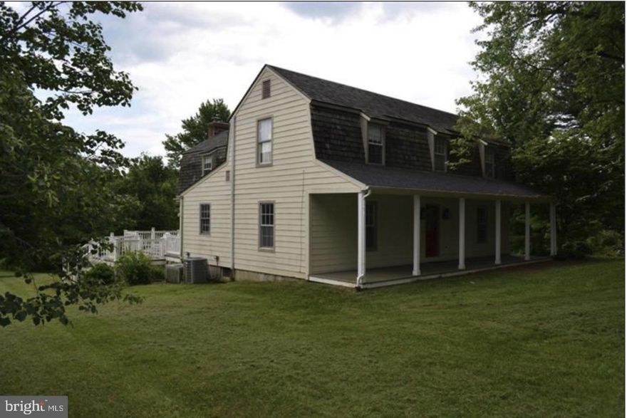 Charming home at the very end of a long lane, backs to 100s of acres. Renovated in 2015 w/ new kitchen cabinets, stainless steel appliances, and granite counters. Hardwood floors thru-out, 1st floor office, large living and dining rooms, 3 upstairs bedrooms w/2 baths & laundry, covered & open decks, Covered front porch, large family room w/ fireplace. Well proportioned rooms, beautiful setting, great house...