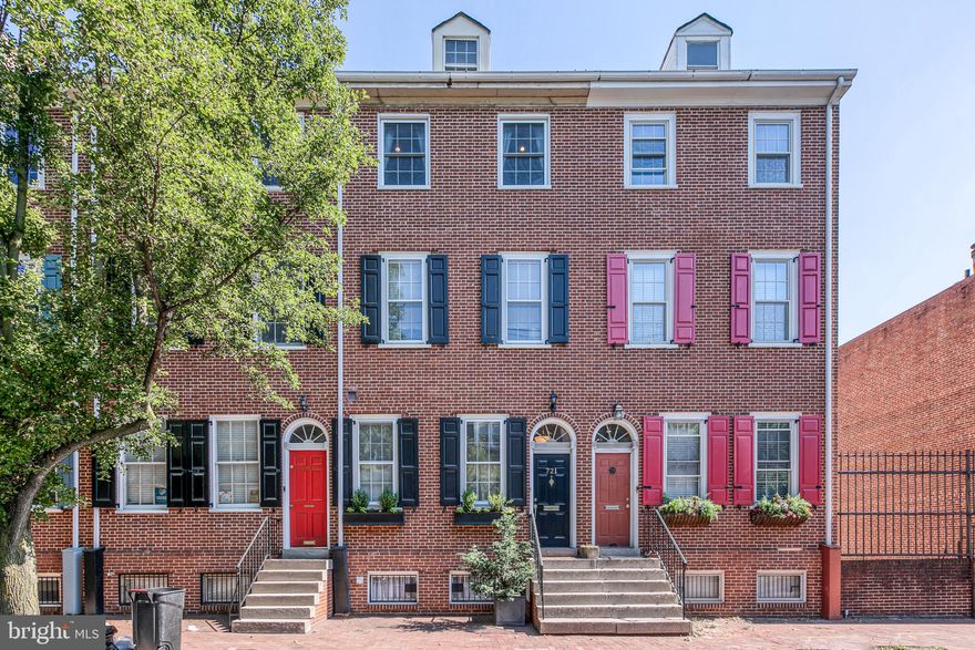 Welcome to this wonderful 3 bedroom, 2.5 bath home with incredible light and space. Everything has been updated to perfection and includes 1 car deeded parking and beautiful hardwood floors throughout. Award-winning contemporary chef's kitchen with huge island, waterfall edge, Thermador appliances, and loads of storage, with a generous dining area overlooking the lower floor and patio. A dramatic 2 story atrium window fills two floors with light and garden views. Downstairs, the large living room is tiled in travertine and marble, complete with heat mat, powder room, gas fireplace and utility room with built-ins, new HVAC system, and stacked washer/dryer. The lovely brick patio is accessed from this floor, with the mature plantings visible from both floors. Floating stairs to the second floor take you to two bedrooms and bath, large closets and more built-ins. The third floor master suite includes a large dressing room with generous built-ins, a large bath with dual vanity, two more closets, and a large light-filled bedroom. Handsome historic facade with flower boxes, McCall School catchment, convenient to Star Garden Park, Washington Square Park and Whole Foods/South Street corridor. This is a beautiful community and this home, with its flow, elegance and charm exemplifies the Society Hill neighborhood. Annual fee of $300 for deeded parking. Parking space number 2, in parking lot, one house away just off Lombard Street.