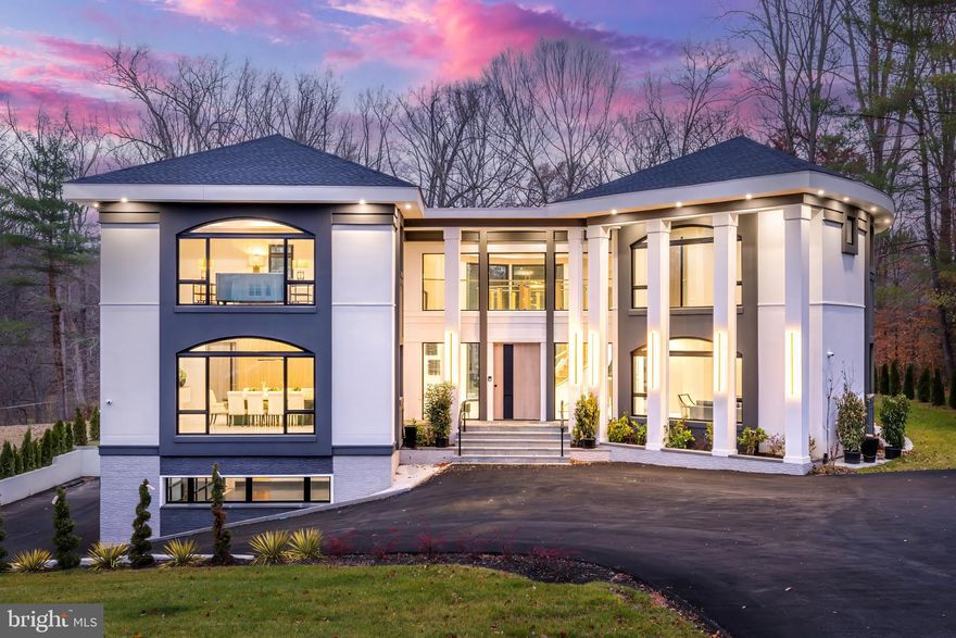 Newly completed and ready for immediate occupancy, with large private lot and ample space for a pool. This cutting-edge contemporary masterpiece by Botero Builders blends unparalleled craftsmanship with a most sophisticated & custom European design, and is the BEST VALUE/ SQFT ON THE MARKET.  An abundance of natural light fills over 10,000 square feet of both grand & intimate living spaces, featuring 6 bedrooms, 7 full baths, and 2 half baths.  This home epitomizes contemporary luxury with modern amenities. The impressive entry showcases an award-winning staircase with the added convenience of an elevator to all  three floors. The open concept offers an expansive dining room with custom built-ins. The gourmet kitchen has double islands,  premium Wolf and Thermador appliances, with a large pantry, ideal for a future spice kitchen, and seamlessly blends into the spacious living room and breakfast area.  A versatile office, which can also serve as a fifth bedroom, completes the main level. On the upper level, each bedroom is a private retreat, featuring panoramic vistas, ensuite baths, and generous walk-in closets. The primary suite is a sanctuary of elegance, offering two lavish dressing rooms, a serene sitting area, and a spa-like bath with a steam shower, double vanity, and luxurious finishes. The walk-out lower level is designed for entertainment and relaxation, boasting a wet bar, a recreation room with patio access, and well-appointed utility rooms. Step outside to enjoy vast outdoor patios, perfect for alfresco dining and lounging, all overlooking the private, sprawling backyard. This meticulously designed home is the ultimate expression of contemporary living, crafted to perfection for those with the most discerning taste. Ready for its new owners to experience a lifestyle of unmatched sophistication, comfort, and style.