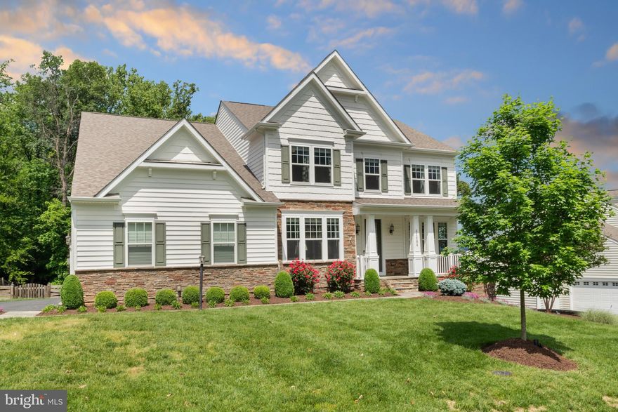 This stunning 5-bedroom, 4.5-bathroom home offers over 5,000 square feet of beautifully designed living space and sits on a spacious, private lot that backs to serene woods. Built less than 10 years ago, this home has been impeccably maintained and  updated throughout.
Wood floors flow seamlessly throughout the main and lower levels. The gourmet kitchen has upgraded cabinetry, a large center island, and granite countertops. The expansive living room features custom built-in shelving, a cozy gas fireplace, and an abundance of natural light—ideal for both relaxing and entertaining.
Need to work from home?  You’ll love the dedicated office space, perfectly positioned for quiet productivity.
The fully finished basement is an entertainer’s dream with an open recreation space, room for games or a home theater, and easy access to the backyard oasis. Step outside to your private hot tub, ideal for unwinding. The lush, oversized lot offers peaceful wooded views and plenty of room to play or entertain.