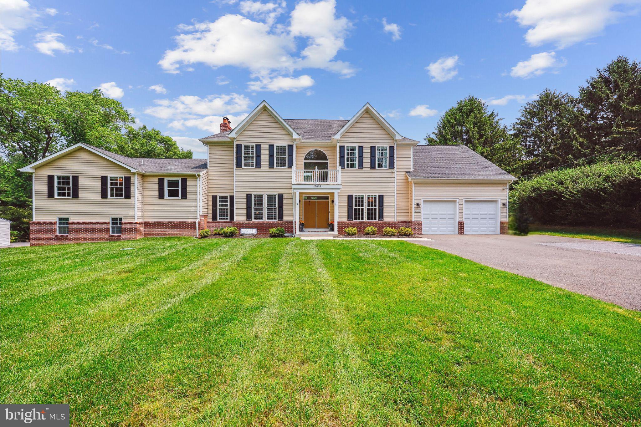 A private resort-style retreat on 1.2 flat acres—custom rebuilt in 2017. Tucked into a quiet Darnestown enclave, this stunning five-level, 7-bedroom home offers over 7,000 square feet of versatile living space and a backyard that feels like a luxury escape. This gorgeous home, custom renovated and rebuilt in 2017, offers five levels of versatile, spacious living and a backyard oasis designed for resort-style relaxation. The fully fenced backyard is a true highlight - featuring a stunning in-ground pool perfect for enjoying sunny days, weekend entertainment, and year-round enjoyment. The expansive patio surrounds the pool and includes space for outdoor dining and lounging, while a brick fire pit, lush gardens dotted with fruit trees, and a private sports court add even more appeal to this exceptional outdoor retreat. Inside, hardwood floors lead from the formal entry foyer into a spacious dining room and a large, light-filled living room. The expansive family room features soaring two-story ceilings, an upper-level overlook, a wood-burning fireplace, and a wall of windows that fills the space with natural light and frames picturesque backyard views. This space flows seamlessly into the large kitchen, which boasts granite countertops, stainless steel appliances, and direct access to the attached garage. A powder room and a mudroom complete this level. Upstairs offers two separate but connected "wings." The first features a cherry wood hallway floor leading to an expansive luxury primary suite with two walk-in closets and a spa-like en-suite full bath. Two additional generously sized bedrooms and a second full bath complete this wing. The second wing, accessed by a second staircase, includes three more light-filled bedrooms—one with its own en-suite bath, and two sharing a hall bath—plus a versatile super closet. The walk-out lower level offers a daylight recreation room with a fireplace, a seventh bedroom, and a fifth full bath. A second basement level provides ample storage and an additional half bath. With close proximity to major commuter routes and to countless dining, shopping, and entertainment options, this home offers the ultimate in luxurious living, space, and convenience. An absolute must see - there is room for everyone here!