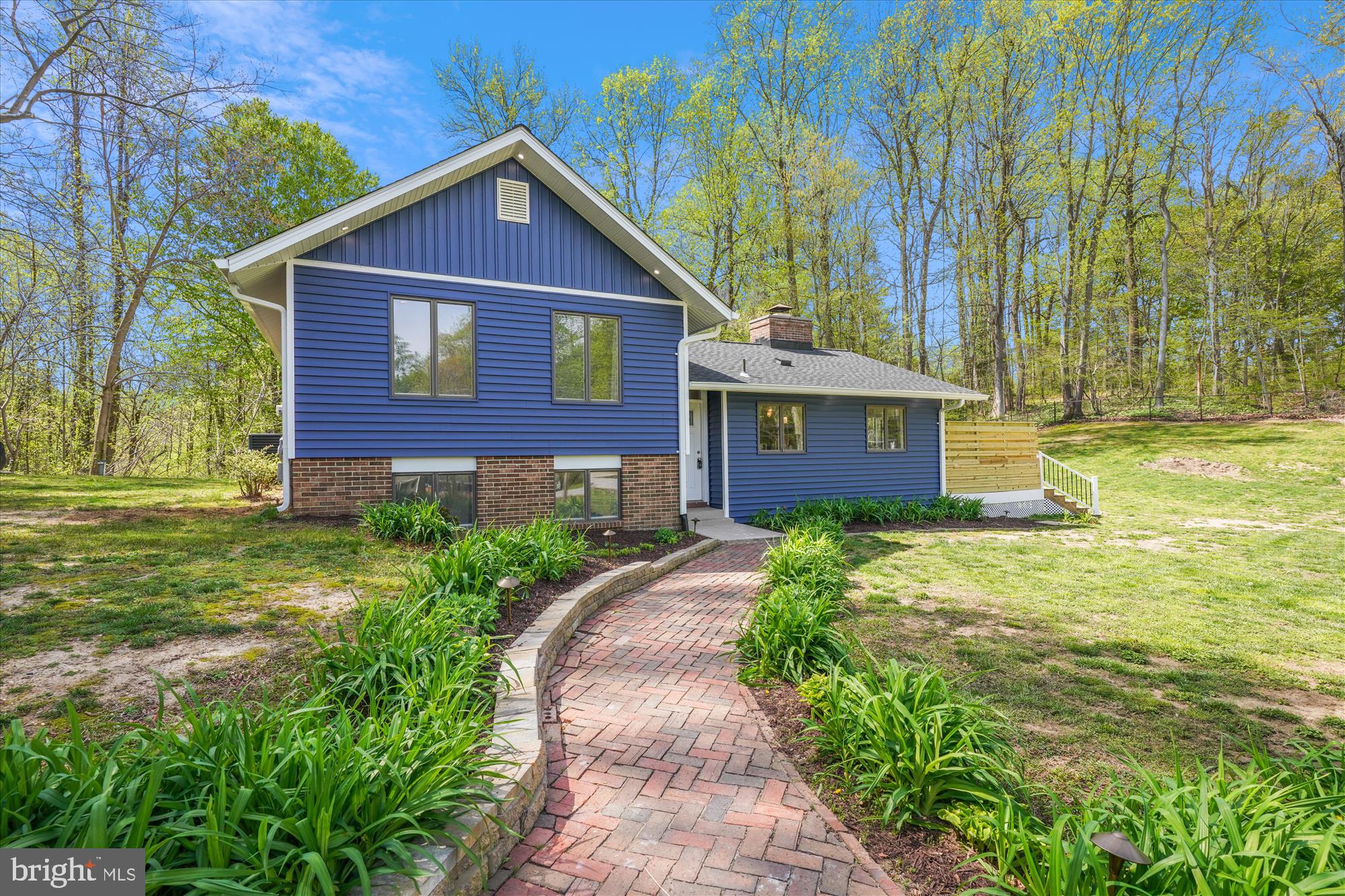 Come check this home out for yourself.. This home has a new roof that was installed in 2023, new HVAC, open floor plan with an updated kitchen with stainless steel appliances, tile and hardwood floors, granite countertops and a large eat around breakfast bar. The sliding doors in the kitchen and dining room, leads to the outside decks overlooking the beautiful landscape of the yard with your very own pool. The amazing large bonus room located off the living room has extra-large windows around as well as it's own split unit.
Enjoy the outside views of nature. This house now has 5 bedrooms. 3 are located on the same level with it's own primary suite and an additional bathroom to share with the other two rooms. There are an 2 bedrooms and 1 full baths and a laundry room on the lower level. This home sits on 1 acre of land surrounded by trees. This house also comes with a basketball court (where the trampoline is located now), above ground pool and plenty of nature. Schedule a showing today.