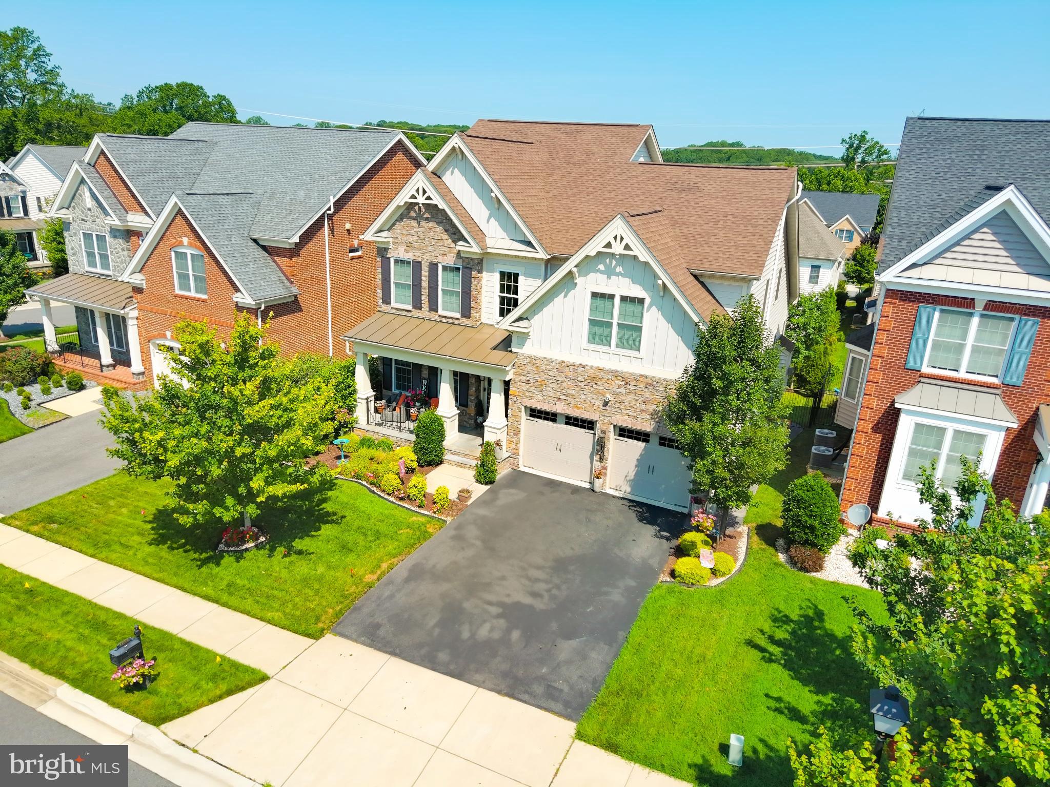 Welcome to Marlboro Ridge, one of Prince George’s County’s most prestigious and sought-after communities. This exquisite home was Built by Toll Brothers and it offers over 5,000 square feet of luxurious living space and is loaded with high-end features and upgrades throughout. Step inside to find a beautifully open floor concept with LVP flooring across the main level, a large study, and a sun-drenched family room that flows seamlessly into the gourmet kitchen. The kitchen boasts a massive island, butler’s pantry, large traditional pantry with LED lighting, and a separate faucet for instant hot water—perfect for tea and cooking.
The upper level features spacious bedrooms, while the fully finished basement expands your lifestyle options with a custom gym area and additional entertaining space. Enjoy the outdoors with a large deck, covered patio with an outdoor entertainment area, and professionally maintained landscaping. Inside, you'll find 19 electric-controlled blinds, a sprinkler system, and a two-car garage offering both convenience and comfort.
Located in a resort-style community, Marlboro Ridge offers exclusive access to a grand clubhouse, swimming pool, fitness center, tennis courts, soccer field, and an equestrian center with stables and riding trails. Scenic walking paths, playgrounds, and parks are woven throughout the neighborhood. You’re just minutes from Rosaryville State Park, Bowie Town Center, and National Harbor, with easy access to Washington, D.C., Annapolis, and major commuter routes.
This home combines elegance, thoughtful design, and unmatched community amenities—don’t miss your opportunity to call it yours