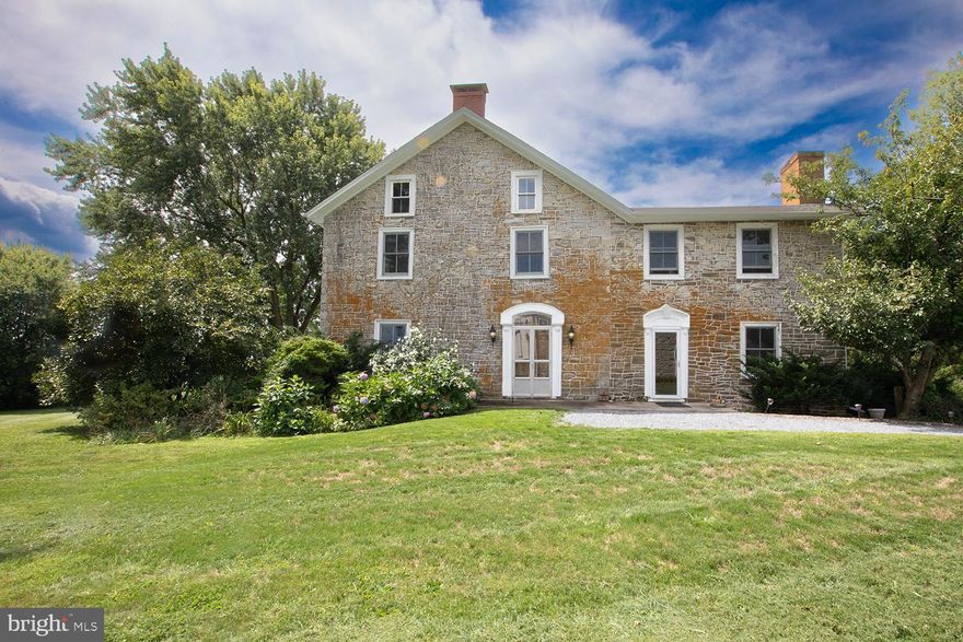 With its country-like setting and proximity to major routes, this farmhouse has 1800 character blended with modern amentities.  The land was part of an original deed from WIlliam Penn in the early 1700s.  Its' earliest owners built a small, 2 story stone structure to house animals below and the family above and the remains of that structure are still visible at the back of the property. The current owners have made numerous, carefully considered upgrades to the property, including but not limited to replacing the furnace, central air, hot water heater, water filtration system, facia, soffits, most gutters and downspouts.  They re-graded the driveway and removed dead trees.   Double doors at the formal entry open to the living room.  There is also a dining room and large kitchen (with many well considered appointments) and a breakfast area with doors opening to a spacious deck.  There is a room that serves as a den which opens to a covered part of the porch, a perfect spot for some outdoor quiet time.  The 2nd floor offers 3 bedrooms and 1 full bath.  The largest bedroom opens onto a balcony.  The 2nd & 3rd bedrooms, while accessed separately from the hallway, have an adjoining door.  The attic is spacious. Note the Roman numerals on the attic beams.  Outside there are several spots for relaxing al fresco.  The outhouse structure was used as a tool shed and there is also a side shed attached to the house for storing larger items.  The whole house generator operates automatically.  All in all, a welcoming respite from our tumultuous world.  Property being sold "AS IS".We welcome your showing appointment, but please don't park on the road.  Use the gravel parking area.