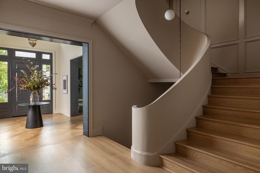 This masterpiece is a true original. Spanning 10,000 sq. ft. across four levels, its centerpiece is a grand ribbon staircase that sets the tone for refined living.

Perfectly positioned just blocks from Rock Creek Park trails and Connecticut Avenue’s dining and entertainment, the home sits among stately residences—including those owned by embassies—on an almost half-acre corner lot with two expansive, flat zones ideal for a private pool.

No other home in Northwest will tour like this: grand yet intimate, newly built yet steeped in architectural refinement.

Crafted by CMX Construction Group, celebrated for their portfolio of luxury homes delivered in 2024 and 2025, with architecture by District Architecture and interiors curated by Storie Collective.