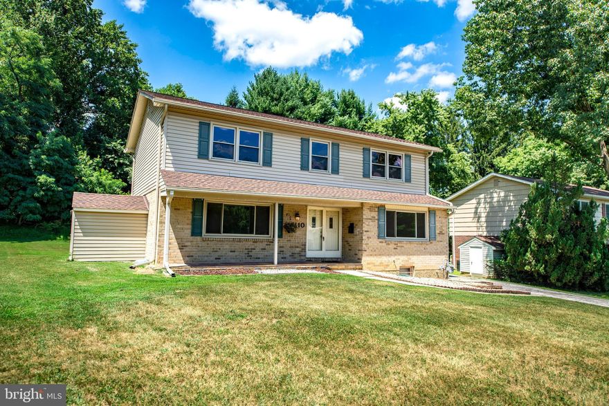 This spacious colonial is nestled onto a quiet street backing to trees.  Featuring 4 bedrooms, 2 full baths, 2 half baths, and 2,688 sq. ft of finished space, there is plenty of room to grow into this beautiful home!  The updated kitchen includes solid surface countertops, stainless steel appliances and table space that walks out to the rear patio.  On the exterior, an attached garden shed,  concrete patio, and level yard that backs to trees will provide a wonderful space to enjoy and entertain.  Sleep easy knowing this home comes equipped with a recently replaced architectural shingle roof (2019) and a Generac Guardian Series home backup power generator.   There have also been many other updates within the past 10 years, including the furnace, hot water heater, windows, kitchen and more!