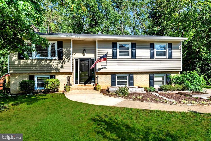 BRILLIANTLY UPDATED BROADNECK TRADITIONAL with UPGRADES AT EVERY GLANCE!  DECORATOR NEUTRAL PALETTE ENHANCING ANY DÉCOR, sleek LVP & hardwood flooring, quality appliances, urban textures of granite & hardwoods, custom built-ins, & recessed lighting.  Totally revamped 3 Full Baths!  Recreational lower level offering in-law/guest quarters and walk-out to pergola patio & tree-bordered yard!  Superb curb appeal with manicured landscaping & low-maintenance siding/brick home exterior.  Abundant windows with desirable integrated privacy blinds framing peaceful, verdant views!  Split Foyer ascending to open concept main level picture window Living Room, Dining Room, & urban stainless/granite Kitchen with dining bar.  Upper level hosting Primary BR w/ensuite wainscoted Bath, 2 additional BRs, & Full Family Bath.  Lower level boasting Family Room, Bedroom/Full BA, laundry & storage areas, and walk-out to pergola picnic patio & fenced yard inviting pets & play.  Multi-vehicle driveway parking.  Established Campus Green community near AA Community College, parks, golf, malls, daily catch eateries, Magothy River/Bay marinas, & commuter RTs 2/97/50.  ALL THE RENOVATIONS DONE FOR YOU!  JUST TURN THE KEY …