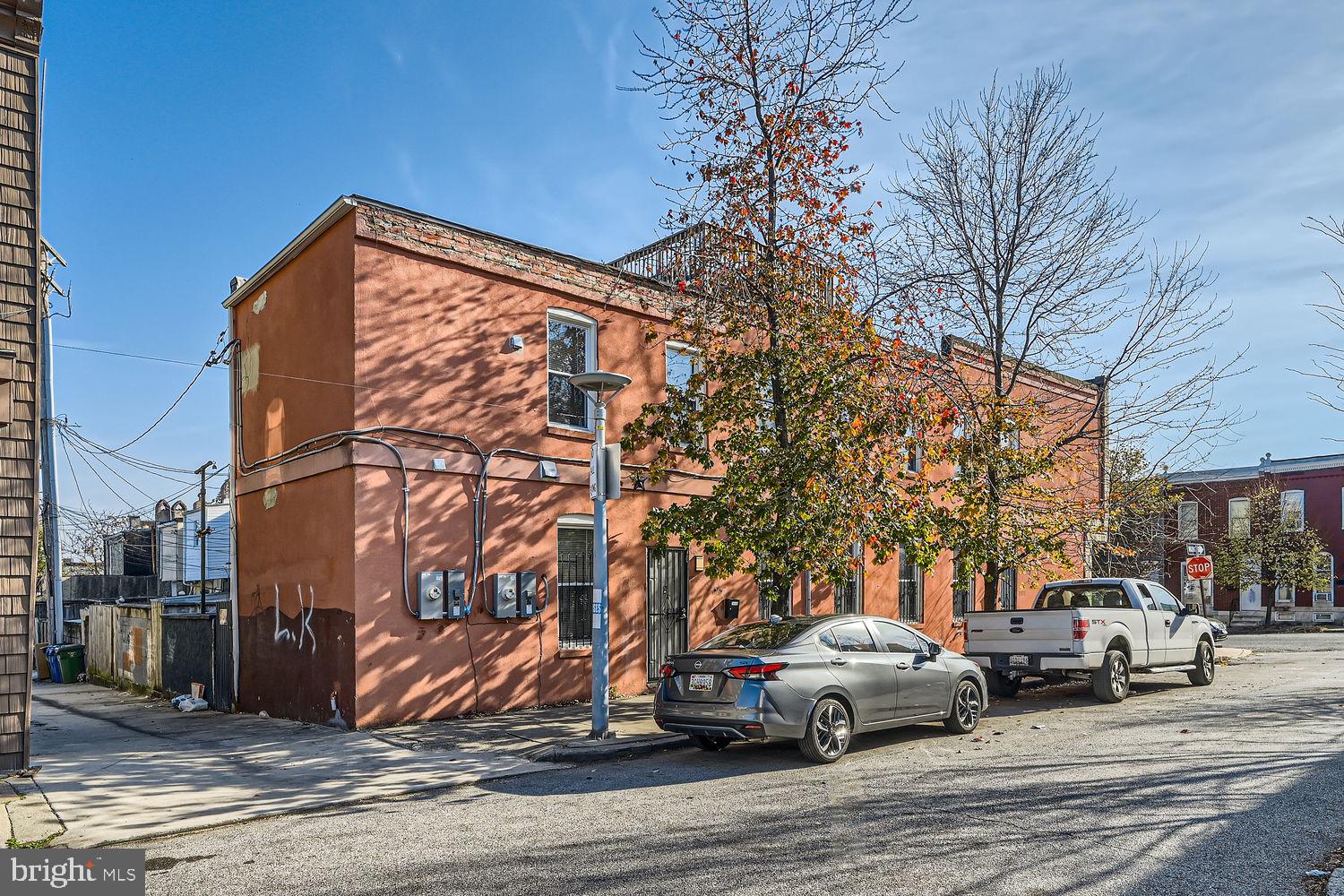 Incredible Investment Opportunity in Baltimore! Perfect for investors looking for a sound investment that will generate income for years or a homeowner that wants to live in one apartment and rent out the other. Be prepared to be amazed with the beautiful renovation including exposed brick throughout, over 12' ceilings and tons of windows for natural light. Welcome to 2424 E Fayette Street, a high-quality, fully renovated (2020) end-of-group (EOG) brick townhouse. Located just two blocks from Patterson Park and less than a mile from Johns Hopkins, this property offers a prime location with modern updates and endless income potential. Featuring two fully separated apartments with private entrances and separate meters, this property is perfect for investors, owner-occupants, or short-term rental entrepreneurs. Unit A features 3 Bedrooms, 2 Full Baths, and a Flexible Lower Level. This expansive unit boasts a bright, open floor plan with exposed brick accents, high ceilings, and recessed lighting throughout. The large kitchen features granite countertops, a breakfast bar, stainless steel appliances, and 42-inch cabinets. Two large lower-level rooms offer flexibility as bedrooms (no windows), a family room, or office space, along with a full bathroom and laundry area. This unit previously rented for $1,880/month and can demand more. Unit B boasts 2 Bedrooms, 1 Full Bath and a Rooftop Deck! This charming second unit offers a stunning open floor plan with a well-appointed kitchen featuring granite countertops, brand-new stainless appliances, and 42-inch cabinets. Exposed brick, high ceilings, and recessed lighting create a modern yet inviting atmosphere. The unit includes two bedrooms, a ceramic-tiled full bath, and a conveniently located washer/dryer off the kitchen. A staircase leads to a private rooftop deck with breathtaking 360-degree city views, ideal for relaxation or entertaining. This unit also previously rented for $1,880/month and can generate more income at present day. Property Highlights include a fully renovated, turn key property with high-end finishes throughout. It can be used also as a short-term rental targeting travel nurses, doctors, and professionals. Walking distance to Patterson Park and easy access to Johns Hopkins, local amenities, and major commuter routes. There are separate entrances and meters for each unit. Don’t miss this exceptional opportunity to own a move-in-ready, income-generating property in one of Baltimore’s most desirable locations. Whether you're looking for a steady rental income, short-term rental business, or multi-generational living, this property has it all. Check out the virtual tours and schedule your showing today!