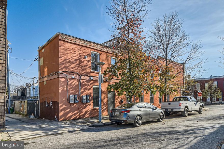 Incredible Investment Opportunity in Baltimore! Perfect for investors looking for a sound investment that will generate income for years or a homeowner that wants to live in one apartment and rent out the other. Be prepared to be amazed with the beautiful renovation including exposed brick throughout, over 12' ceilings and tons of windows for natural light. Welcome to 2424 E Fayette Street, a high-quality, fully renovated (2020)  end-of-group (EOG) brick townhouse. Located just two blocks from Patterson Park and less than a mile from Johns Hopkins, this property offers a prime location with modern updates and endless income potential. Featuring two fully separated apartments with private entrances and separate meters, this property is perfect for investors, owner-occupants, or short-term rental entrepreneurs. Unit A features 3 Bedrooms,  2 Full Baths, and a Flexible Lower Level. This expansive unit boasts a bright, open floor plan with exposed brick accents, high ceilings, and recessed lighting throughout. The large kitchen features granite countertops, a breakfast bar, stainless steel appliances, and 42-inch cabinets. Two large lower-level rooms  offer flexibility as bedrooms (no windows), a family room, or office space, along with a full bathroom and laundry area. This unit previously rented for $1,880/month and can demand more. Unit B boasts 2 Bedrooms, 1 Full Bath and a Rooftop Deck! This charming second unit offers a stunning open floor plan with a well-appointed kitchen featuring granite countertops, brand-new stainless appliances, and 42-inch cabinets. Exposed brick, high ceilings, and recessed lighting create a modern yet inviting atmosphere. The unit includes two bedrooms, a ceramic-tiled full bath, and a conveniently located washer/dryer off the kitchen. A staircase leads to a private rooftop deck with breathtaking 360-degree city views, ideal for relaxation or entertaining. This unit also previously rented for $1,880/month and can generate more income at present day. Property Highlights include a fully renovated, turn key property  with high-end finishes throughout. It can be used also as a short-term rental targeting travel nurses, doctors, and professionals. Walking distance to Patterson Park and easy access to Johns Hopkins, local amenities, and major commuter routes. There are separate entrances and meters for each unit.  Don’t miss this exceptional opportunity to own a move-in-ready, income-generating property in one of Baltimore’s most desirable locations. Whether you're looking for a steady rental income, short-term rental business, or multi-generational living, this property has it all. Check out the virtual tours and schedule your showing today!