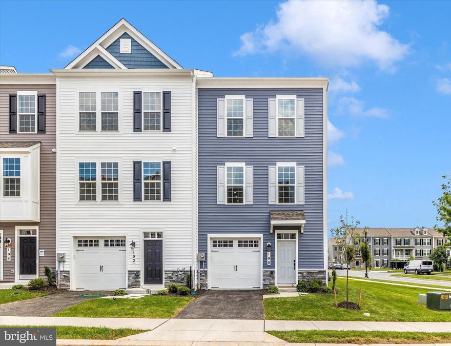 This MOVE-IN-READY Auburn II luxury townhome at Spring Bank by PDR Homes features three finished levels, 4 bedrooms, 3.5 bathrooms, and a 1-car garage, all in a walkable location near Clemson Corner and Market Square. Enjoy designer upgrades throughout, including a gourmet kitchen with quartz countertops, stainless steel appliances, subway tile backsplash, a large center island with pendant lights, and a sunroom extension. The owner’s suite includes a vaulted ceiling,  walk-in closet, and a spa-inspired bathroom with an oversized, floor-to-ceiling tiled shower. Lower level rec room/4th bedroom with closet and full bathroom.  Photos are representative. Take advantage of this LIMITED-TIME OPPORTUNITY - move in now and choose $15,000 toward closing costs or a 2/1 rate buydown for BIG SAVINGS on your first two years of payments!