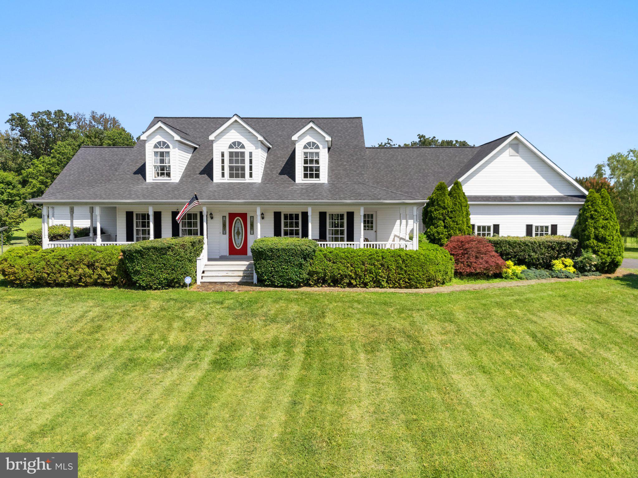 Tucked away at the serene end of a quiet gravel road in Bealeton, this beautifully maintained Cape Cod home sits on an expansive 9.92-acre parcel embraced by mature trees and natural privacy. A rare blend of classic charm and tranquil living, the property offers a peaceful retreat without sacrificing comfort or elegance.
The home features four spacious bedrooms (one used as an office) and four full and one half bathrooms, thoughtfully designed to accommodate both family living and guest entertaining. Rich wood floors flow throughout the main level, adding warmth and timeless appeal, while two inviting gas fireplaces—one in the family room and another in the basement rec room—create welcoming spaces for gathering or quiet reflection.
Classic Cape Cod architecture meets modern functionality, with quality finishes throughout and a flowing layout that supports everyday life as well as special occasions. A charming front porch welcomes you home, perfect for morning coffee or evening conversation, while a generous back porch offers a shaded spot to unwind and take in the view.
Step off the back porch onto a beautiful stone patio—an ideal space for entertaining, outdoor dining, or simply enjoying the peace of your private, wooded surroundings. The nearly 10-acre lot provides endless opportunities for gardening, exploration, and enjoying the natural beauty of Virginia countryside.
A two-car garage adds convenience and storage, completing this exceptional property. Whether you're looking for a weekend getaway or a full-time residence, this hidden gem delivers timeless character, thoughtful updates, and the kind of quiet seclusion that’s increasingly hard to find.
