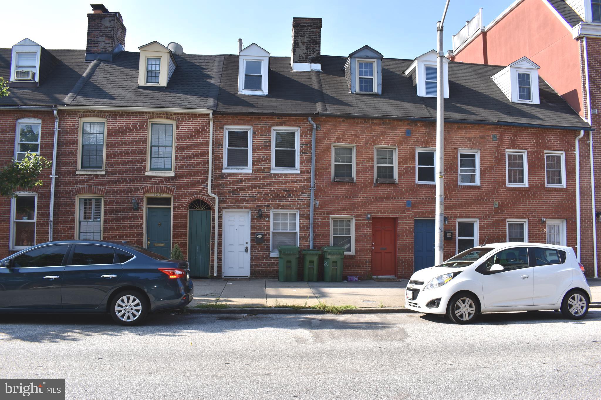 Are you looking to reside in the heart of Fells Point? This townhome is all about location. Walk to unique retail shops, restaurants and pubs. Almost 800 sq ft of living space. Main level includes living room, galley kitchen, half bath, laundry & access to fenced patio area. Upper level allows for 2 generously sized bedrooms and a full bath with shower/tub. Cat and small dogs welcome.
