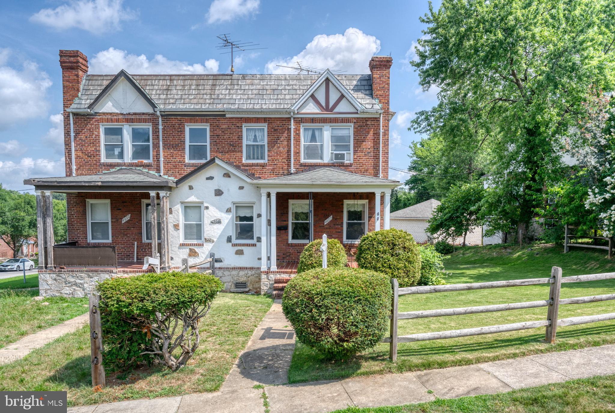 Welcome to this Classic 1930's Brick Home Located in the Walther Neighborhood. The home has three large bedrooms, one and a half bathrooms, newer windows, hardwood floors throughout and over 1600 square feet of living space. The separate living room and dining room has lots of room for entertaining. There is a finished basement with a wet bar and a walkout to a great backyard and large parking pad. The backyard is also accessible from the kitchen side door. The front porch is perfect for more entertaining space or to just sit back and relax.