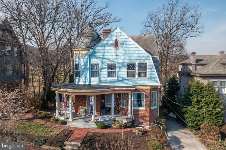 STUNNING VICTORIAN HOME ON HISTORIC WASHINGTON STREET! Welcome to 611 Washington Street, a beautifully restored circa 1901 home offering five bedrooms, 3.5 bathrooms, and three full levels of living space. Located in the historic district, this exceptional home offers breathtaking mountain and city views. From the moment you arrive, the home’s charming curved front porch sets the tone for the character found throughout. Inside, a spacious foyer showcases exquisite woodwork, hardwood floors, and original fireplaces, leading to a formal living room, an elegant dining room, and a library with custom built-in bookcases. The renovated kitchen features stainless steel appliances, a center island, and ample workspace, while a convenient half bath completes the main level. Two staircases lead to the second floor, where you’ll find four bedrooms, two full bathrooms, and a versatile walk-in closet or office space. The fully finished basement offers incredible flexibility with a second kitchen, fifth bedroom, full bathroom, and laundry area. Additional highlights include a walk-up attic, central air, and off-street parking.  All within walking distance to downtown Cumberland and with easy access to I-68!