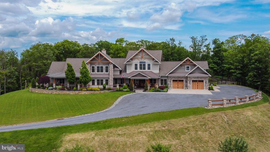 This stunning, timber frame inspired style home, built in 2016, boasts an impressive 7,400 square feet of living space w/ 4 bedrooms and 5 bathrooms. Nestled on 20.56 acres, it offers breathtaking views of the Williamsport area. With its rustic and luxurious amenities, this property is perfect for those seeking comfort and elegance in a tranquil setting. The expansive grounds provide ample opportunities for outdoor activities, while the spacious interiors are ideal for entertaining or relaxing with family. Outside there is an in-ground pool and pool house with an outdoor fireplace and pizza oven. The guest quarters offer a spacious apartment, 3 car garage and a custom butcher shop. There is a new 2-car garage with a workshop ready for your finishing touches. Do not miss this opportunity!