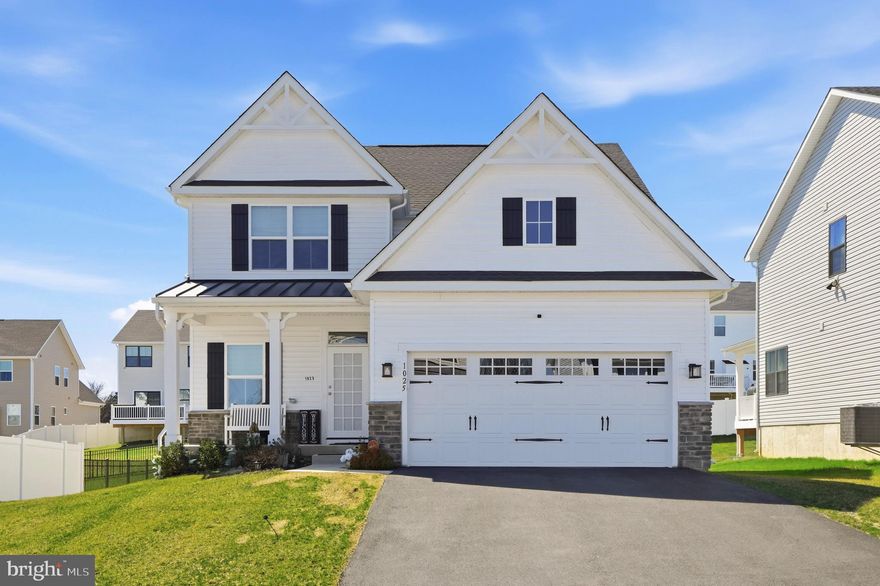 Welcome to 1025 Trillium Lane, a masterclass in "Modern Farmhouse" elegance nestled within the prestigious Ashbourne Meadows Community Association. Built just two years ago, this 3-bedroom, 3.5-bathroom residence offers the pristine allure of new construction without the wait.

The open-concept main level is defined by soaring ceilings, wide-plank flooring, and an abundance of natural light. At its heart lies a gourmet chef’s kitchen, featuring crisp shaker cabinetry, quartz countertops, and a stunning herringbone backsplash. The space flows seamlessly into a great room anchored by a dramatic floor-to-ceiling stone fireplace—the perfect backdrop for both quiet evenings and lively gatherings.

Retreat upstairs to find a versatile loft space, ideal for a home office or library. The primary suite is a true sanctuary, boasting a spa-inspired ensuite with a massive, designer-tiled walk-in shower. Two additional well-appointed bedrooms ensure ample space for family or guests.

The lower level is the ultimate lifestyle upgrade. Fully finished for entertainment, it features a sleek wet bar with custom dark cabinetry and a full third bathroom, making it an ideal footprint for a media room, gym, or guest quarters.

Located in the heart of Cheltenham Township, this home offers sophisticated, low-maintenance living in a vibrant, newly developed community. Why settle for "coming soon" when perfection is already here?