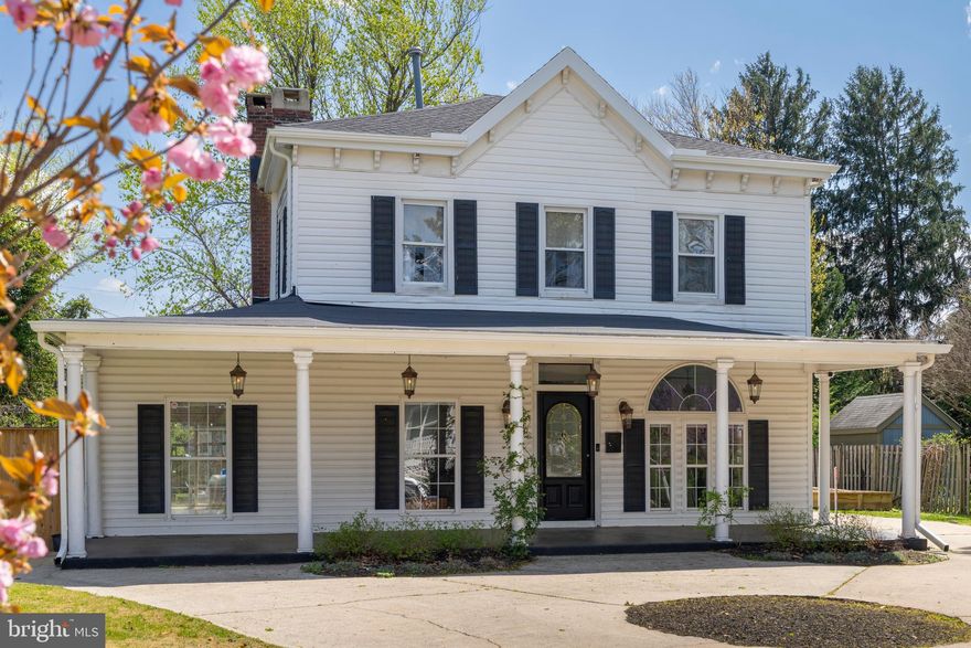 NEW Roof 2025, fence and stone patio 2023. Welcome to 425 Winston Avenue.  A beautifully maintained and recently updated historical home built in 1900. This home seamlessly blends modern updates while maintaining all of its gorgeous character. Boasting 5 generously sized bedrooms, and 2.5 baths, there is nothing this house is lacking. Immediately upon pulling up you notice the oversized fenced in yard, and a stunning full circle driveway with parking for up to 10 cars. You are quickly greeted by a large colonial style porch and double sliding doors which further enhances the indoor to outdoor entertaining space. This courtyard style backyard offers designated garden space, a seating area for al fresco dining in the coming warm weather, and plenty of grass for kids and pets to play.  Inside you can appreciate the beautiful hardwood floors and fireplace. With all 5 bedrooms on the second floor, your opportunities are endless. Whether you utilize the numerous living areas for hosting friends and family or convert them into a beautiful playroom, space is not something you will be missing. Following the beautiful woodwork upstairs you will find a master bedroom with an oversized ensuite and walk-in closet, as well as 4 additional bedrooms.  Walking distance to Sherwood Gardens, Loyola University and Notre Dame, this home is a private sanctuary in the heart of Baltimore.