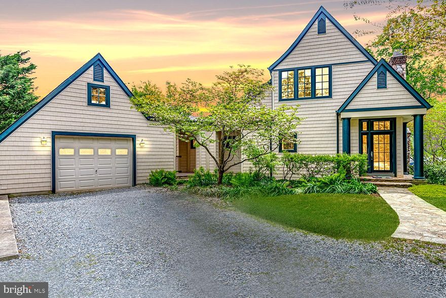 Price Adjustment on this CUSTOM CRAFTSMAN tucked away in lushly landscaped natural surrounds with a shared pier on protected Little Burley Creek!  A MASTERPIECE BY ARCHITECT Vincent Greene with NEW Architectural  ROOF (2023) and PRISTINE WATER VIEWS from all rooms! NEW  TREX TRANSCEND® DECK (2023) enjoy being serenaded by birdsongs with local wildlife visiting from their undisturbed habitats. A KAYAKER’S PARADISE with access to Mill Creek, Cantler’s daily catch dining, and the Severn River spilling into the Bay! Organic textures including rich oak floors, native stone fireplace & walkways, cedar closet, and abundant windows bringing nature indoors. Main level light-drenched, open concept Living & Dining Rooms with stone fireplace ambiance. Main level Bedroom opening to deck w/ensuite Bath boasting jetted spa tub/separate shower! Additional Half Bath with  closet with NEW high-end Speed Queen stackable washer/dryer. Ascending staircase with built-in library/objets d’art bookcases. Upper level Bedroom w/Full Bath. One-car garage connected by breezeway; extra driveway parking. Kayak/paddle board waterside storage garage. Peaceful Beechwood on the Burley offering proximity to downtown Annapolis, the USNA, Westfield & Towne Centre Malls, the Bay Bridge, and commuter RTs 50/2. Non-mandatory HOA. 
NATURE LOVERS’ WATERFRONT RETREAT!