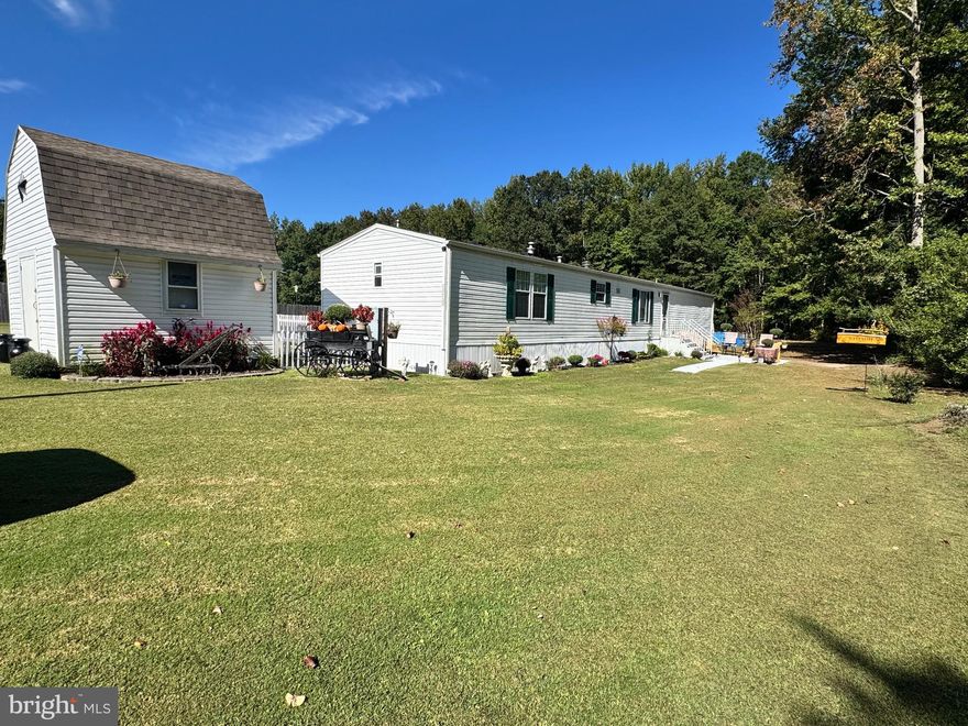 Come check out this well maintained 3 bedroom, 2 full bath home in Dover DE. Home is a 2006 Clayton model, that has been put on a permanent foundation. There have been many updates over the past few years, including, new hardwood floors, new carpet, updated bathrooms, new refrigerator, washer and dryer. Home sits on .96 acres of flat land, with 2 sheds and an above ground pool (as-is). There has been beautiful landscaping done around the entire house, as well as a deck on the back side of the home. Home is located out in the country, but still close to the main highways and stores. Home is ready for its new owners, Schedule your tour today!