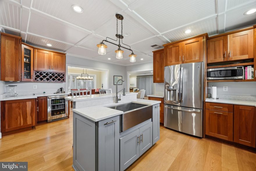 Expansive views stretch along Jackson Creek to the Chester River, creating a waterfront setting that is truly exceptional. For anyone who loves life on the water, this property offers a rare opportunity, complete with a sandy beach and impressive waterfront frontage. The outdoor amenities are designed for both relaxation and recreation, including a pier with boat lift and electric, a beach house cabana, pool, pergola, hardscape, and plenty of space for poolside entertaining.

Natural light fills the home from sunrise over the Chester River throughout the day as the sun moves west. The main house is in excellent condition and offers multiple living spaces, including three sitting areas, a breakfast room, and a formal dining room. Beautiful finishes include hardwood floors, cherry kitchen cabinetry, stainless steel appliances, and a beverage bar. A stone fireplace adds warmth and ambiance to the open living areas.

The home features five bedrooms, three full baths, and one-half bath, with hardwood flooring throughout both levels. A first-floor bedroom with a full bath provides flexibility for guests or multigenerational living. The primary suite is ideally positioned on the waterside and includes a private balcony. An indoor porch, outdoor porches, and a game room make this home especially well-suited for entertaining.

Surrounded by mature trees, the property also offers a spacious yard with fencing already in place for children and pets.