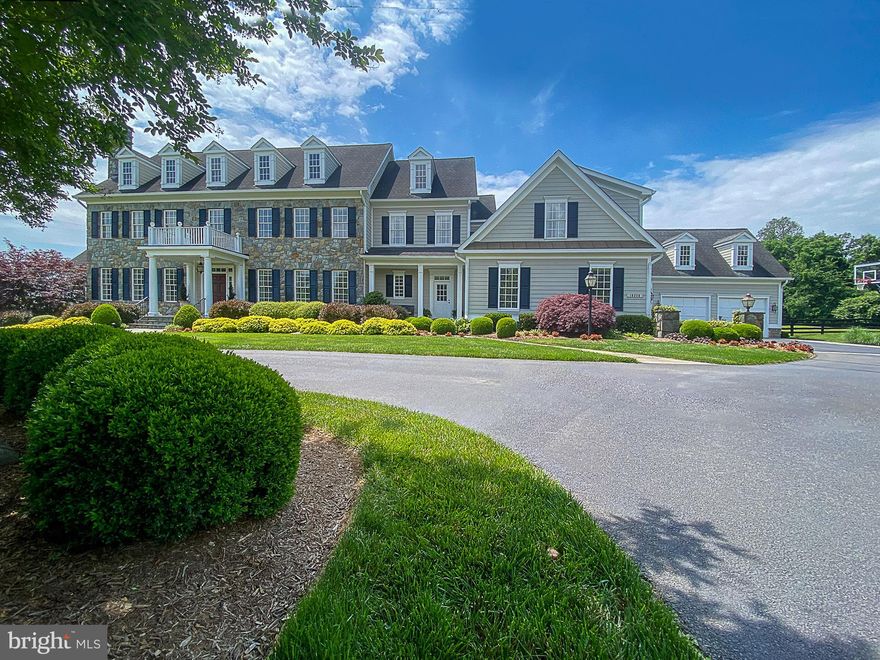 With sweeping Blue Ridge Views and rolling terrain on over 13 acres along coveted historic Snickersville Turnpike in Western Loudoun.  Stunning Classic Hunt Country residence with circular drive, stone pillar entry, motor court with a four car garage. Many rooms freshly painted and decorator features throughout.  Outdoor stone paver walkways/patios, stone walls, multiple balconies with mountain views. Impressive Mitchell & Best design with over 10,000 square feet expanding three levels,  custom moldings, built-ins and grand features throughout.  Thoughtfully designed for luxurious everyday living or grand entertaining.  Six bedrooms, six full baths and three half baths. Three fireplaces, mudroom with powder room, gallery wall, main-level study with built-ins, sunroom with wall of windows.  Solid Wide-plank hardwoods on the main-level and upper landing.  Custom niches and reading nooks lend to the unique layout and features.  Chef’s kitchen with a Wolf rangetop with griddle, double ovens, commercial Sub Zero refrigerator, warming drawer, Wolf built-in steamer, Sub Zero wine fridge in the butler's pantry.  Enjoy al fresco dining on the covered stone patio off the kitchen and breakfast room.  Located off the kitchen, the family room has custom built-ins, gas fireplace and tray ceiling with crown molding.   Primary bedroom with French door entry, private balcony with sweeping views, gas fireplace, dual walk-in closets, private sitting room with wetbar/built-ins. Luxury primary bath with open shower with dual showerheads, dual water closets.  Additional highlights include separate guest suite (au pair), an amazing lower level with wetbar, media room with powder room, gym, wine room, sixth bedroom with en suite bath (in-law or au pair suite)  and ample storage.  Fine Art lighting, custom decorator finishes throughout.