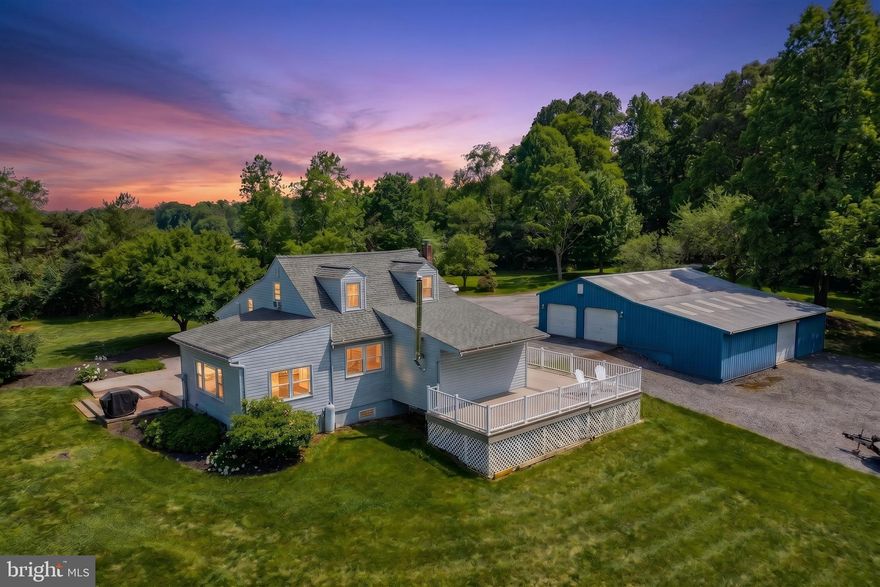Get away from it all at this secluded 12-acre piece of paradise in the heart of York County. Nestled among peaceful surroundings, this well-maintained Cape Cod offers the perfect blend of comfort, privacy, and space for entertaining or raising a family.

Inside, you’ll find spacious rooms filled with warmth and character. The kitchen is designed for gathering and everyday living, featuring Corian countertops, abundant cabinet space, and a large center island with a gas cooktop. The formal dining room easily accommodates large family gatherings and holiday celebrations. The first floor includes a generously sized primary bedroom and a large living room highlighted by a cozy wood-burning stove. The perfect place to relax on a cold winter evening.

Significant updates provide peace of mind and modern convenience, including a full custom primary bath remodel completed in 2025, a new furnace installed in 2022, a composite deck replacement in 2021, and the front portion of the roof replaced in 2024.

Outdoor living is just as impressive, with a spacious composite deck and stamped concrete patio ideal for entertaining, relaxing, or simply enjoying the scenic surroundings. Car enthusiasts, hobbyists, and those needing extra storage will appreciate the oversized 4+ car garage. Truly a dream setup with ample space for vehicles, equipment, and projects. There is also plenty of parking available for guests.

Offering the serenity of country living while remaining convenient to Red Lion, York, and surrounding amenities, 743 Snyder Corner Rd is a rare opportunity to own a private retreat with room to live, entertain, and enjoy nature year-round.