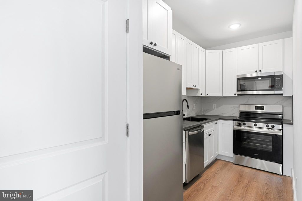 Photo of 929 N 40th Street #E, PHILADELPHIA, PA 19104 (MLS # PAPH2576362)