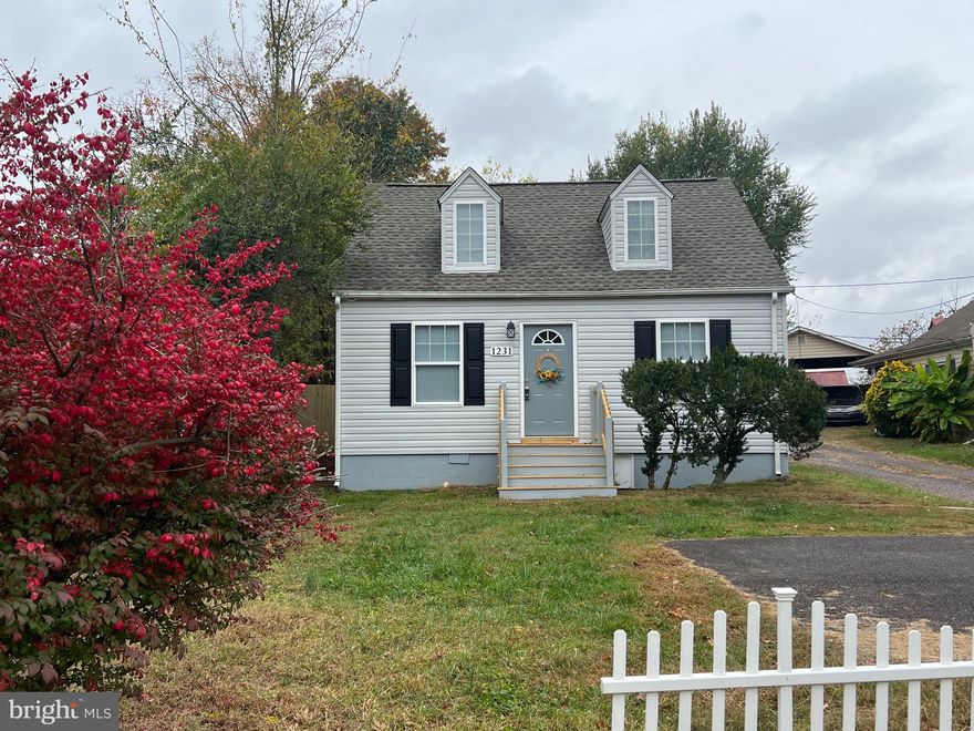 This updated Cape has a main level  primary with bathroom including dual vanity & bright spacious tile shower.  Owner has opened the living area to flow from living room, kitchen to dining area.  Upstairs are 2 bedrooms with a full bath in the middle. Parking in front or in back, rear yard also has space for enjoyment and a stone patio. Conveniently located across from Yowell elementary school.