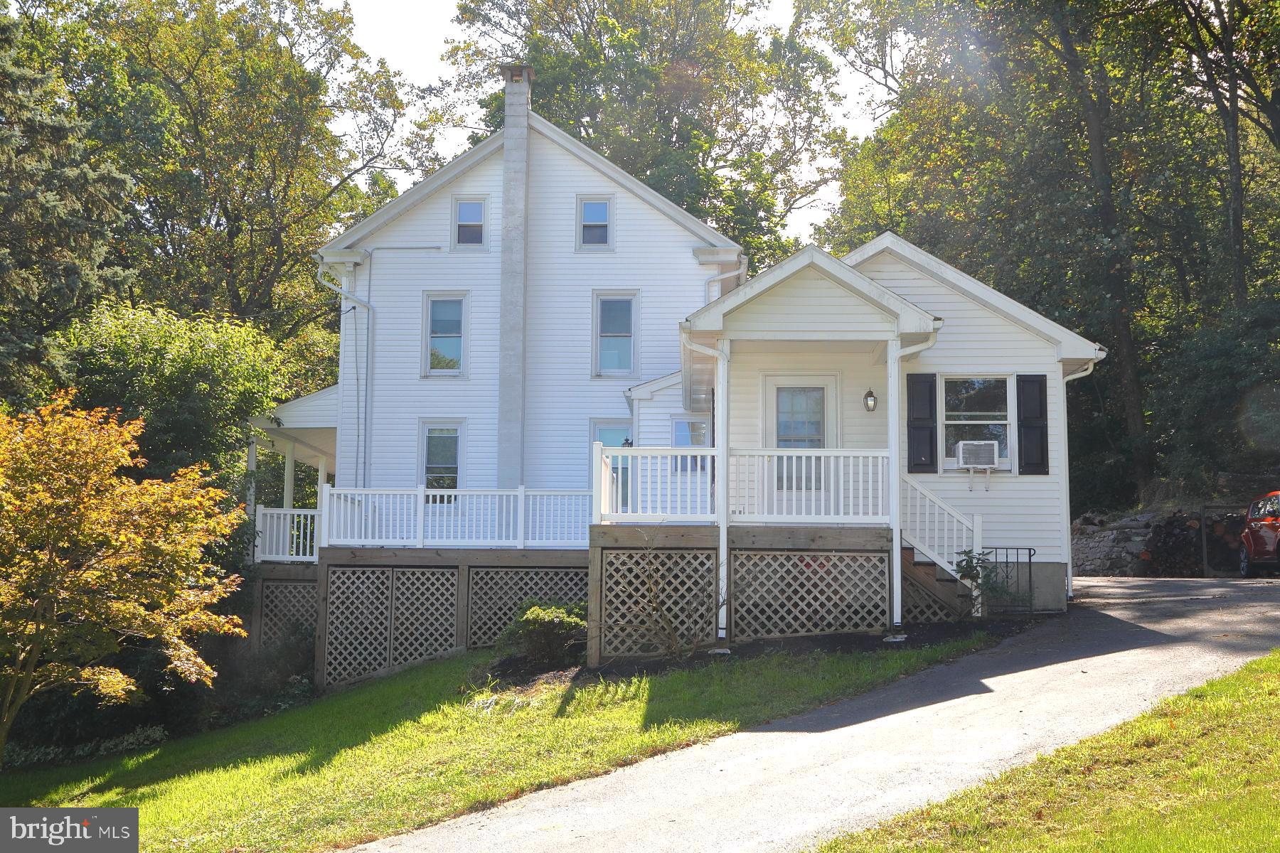 Charming single home on almost 2 acres in desirable area with panoramic views of beautiful mountains! Step inside this beautifully renovated home with new modern kitchen w/ S.S. appliances, open floor plan, preserved stone fireplace, high ceilings and an in-law suite that could easily be a 1st floor master/office/family room. Step upstairs where you will find 3 additional bedrooms and full bath! Outside you will find an oversized 2 car garage, extensive stone wall and driveway that wraps completely around home for your convenience and added parking! Brand new septic tanks and drainfield installed in 2022. The possibilities are endless here! You are sure to see an abundance of wildlife right out your back door while the deer pick away the apple trees! Schedule your private showing today because at this price it won't be here tomorrow!