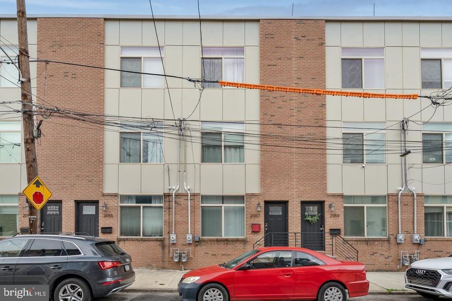 Welcome to 2057 E Letterly! This spacious, 3 bedroom, 2.5 bath townhome in East Kensington was built in 2017 and has roughly 2 years of tax abatement remaining. Step inside to discover a thoughtfully designed open layout on the first floor boasting a designer kitchen with granite countertops and large island. The second floor features a full laundry room, full bath, two spacious bedrooms, and ample closet space. The luxurious primary suite awaits you on the third floor. The primary bath includes a soaking tub, oversized shower, and double vanity. The expansive bedroom includes a huge walk-in closet. Need more space? The finished basement offers versatility, serving as a fourth bedroom and powder room, with additional storage space for your convenience. Experience views of Philadelphia from the roof deck, perfect for entertaining. Two HVAC systems ensure customized comfort throughout the year, while hardwood and tile floors, 9' ceilings, and recessed LED lighting add to the home's appeal. Schedule your tour today!