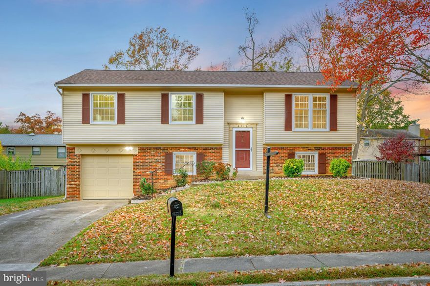 Move in just in time for the holidays! This welcoming 4-bedroom, split-foyer home with an attached garage has been beautifully remodeled and is ready to host your festive gatherings. Key highlights include: a brand-new kitchen with sleek white shaker cabinets, quartz counters, and stainless-steel appliances; remodeled bathrooms; a cozy family room with a fireplace; and fresh carpet throughout the bedrooms on both levels. Enjoy the convenience of a central air and heating system, a brand-new roof, windows, new rear siding, and a recently installed mailbox. Plus, this home’s prime location puts you close to schools, shopping, and commuter routes, offering quick access to Washington, DC, Old Town Alexandria, National Harbor, Mount Vernon, Fort Belvoir, and the National Guard.
This home’s open floor plan welcomes you in, providing great natural light across both levels. The main level features a spacious living area, seamlessly connecting to a deck that’s perfect for outdoor entertaining. Step down into the lower level to find the family room, with a sliding glass door leading to a private fenced yard and patio for more intimate gatherings. The primary bedroom boasts two closets—one a walk-in—with an ensuite bath, ensuring a relaxing retreat.
Living here means you’ll enjoy nearby parks, adding outdoor fun and scenic beauty to your daily life. Convenient commuter bus access to the Metro, easy drives to nearby airports, and proximity to vibrant Alexandria and Washington, DC, make this home ideal for anyone seeking comfort and convenience. Imagine celebrating this holiday season in your new home, surrounded by comfort and a community that offers so much. With every thoughtful upgrade, this property is more than move-in ready—it’s ready to welcome you home.