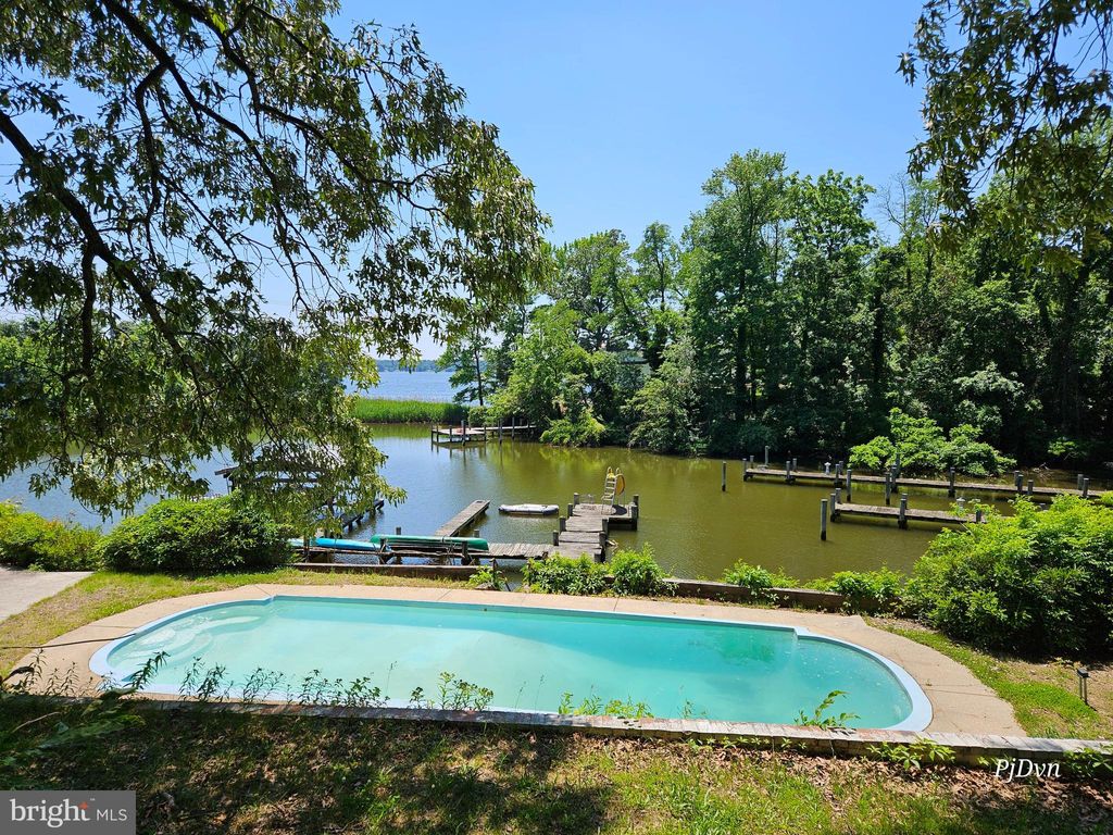 Photo of 355 Sturtons Lane, PASADENA, MD 21122 (MLS # MDAA2128488)