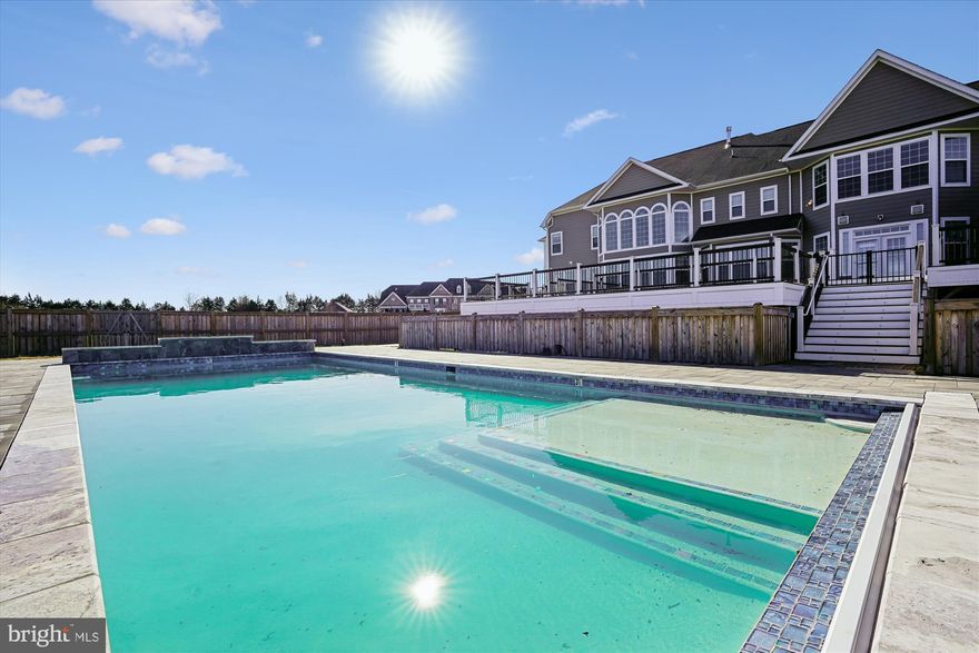 Experience the epitome of luxury living in this stunning Colonial home, beautifully renovated in 2023, nestled within the serene community of Hunters Pond. Spanning over 5 acres, this exquisite residence offers an unparalleled lifestyle, combining elegance with modern comforts. Step inside to discover a harmonious blend of high-end finishes and thoughtful design. The spacious layout features five generously sized bedrooms and seven and a half bathrooms, ensuring ample space for relaxation and entertainment. The heart of the home boasts a fully finished basement with daylight windows, perfect for hosting gatherings or enjoying quiet evenings by the fireplace. The gourmet kitchen is a chef's dream, equipped with top-of-the-line appliances and stylish cabinetry, seamlessly flowing into inviting living spaces. Enjoy the luxury of multiple laundry areas, making daily routines effortless. Outside, your private oasis awaits. Dive into the in-ground pool, surrounded by a secure fence, or unwind on the expansive patio, perfect for alfresco dining and entertaining. The attached oversized garage provides convenience and ample storage. With meticulous attention to detail and a commitment to excellence, this home is not just a residence; it's a lifestyle. Embrace the tranquility of nature while being just moments away from modern amenities. This is more than a home; it's where your dreams come to life.