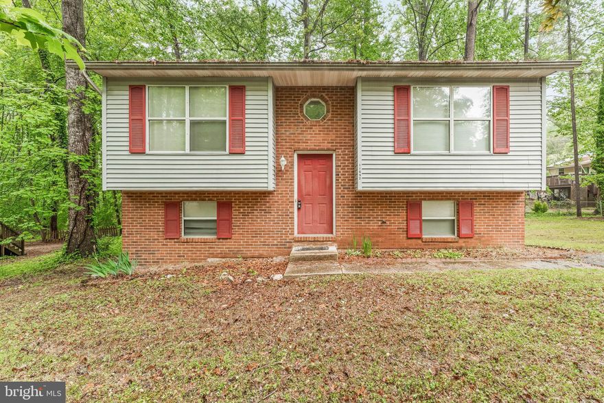 PRICED RIGHT! 4 Bedroom 2 Bathroom Split Foyer on a large corner lot in CRE! Upstairs a good sized living room flows into the dining room which has additional storage/counterspace. The kitchen has ample cabinetry and fully functional appliances. Just down the hall are two large bedrooms, one of which is considered to be the primary bedroom due to its size and lovely skylight that brings in tons of natural light! A hall bathroom completes the top floor. Downstairs a recreational area/second living room provides access to the laundry room, two additional large bedrooms, the 2nd full bathroom, and a set of French doors leading to the rear patio. Outside, two sheds provide plenty of additional storage! Homes at this price point are hard to find and this one is not likely to last on the market! Set up a showing ASAP!