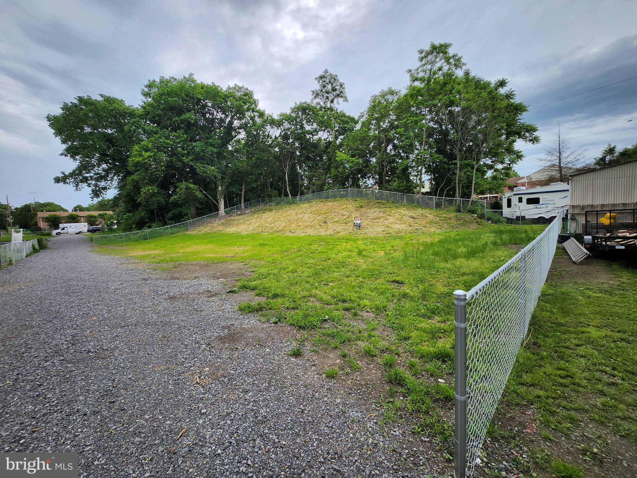 Three city lots combined to make a large lot ready to for your build. Recently excavated and partially cleared to make room for a structure. Possible home or garage(s) on this site. Schedule your appointment today.