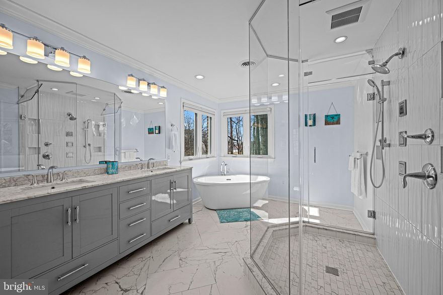 All brick colonial on a very private, wooded 2.5 acre lot in Bradford Estates with NO HOA!! Start to unwind as you head down the long, peaceful driveway that is tucked away from neighbors and surrounded by wildlife.  Upon entry, you will be greeted with a two-story foyer, beautiful wooden staircase, rich solid wood colonial style doors and hardwood floors that span the entire main level. The kitchen has an attached breakfast nook and features granite countertops, stainless steel appliances and a center island induction cooktop with overhead stainless steel exhaust fan. The family room opens onto an expansive deck with an attached gazebo, which is the perfect spot to sit and enjoy the peaceful setting and decompress with a cup of coffee or evening cocktail. However, the privacy doesn’t end in the backyard; each bedroom has its own private bathroom. The updated primary bath includes a soaking tub and luxurious walk-in shower. The finished walk-out basement includes a kitchenette, family room and bedroom with ensuite. The side-load 2 car garage has built-in workbenches and a huge walk-up storage loft. A large detached shed provides even more storage. Additional home features include an energy efficient geothermal dual zone  HVAC system, a tankless hot water heater, a whole house water filter and water softener system.  The roof is approx. 7 years old with new gutters installed in 2024. 
Enjoy the best of both worlds- your own private retreat, yet mere minutes from a vast amount of local amenities and major commuter routes.