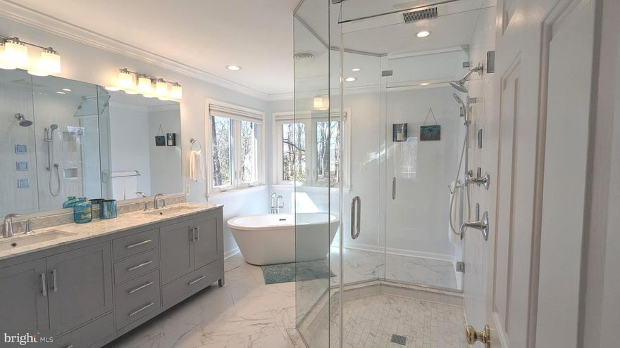 All brick colonial on a very private, wooded 2.5 acre lot in Bradford Estates with NO HOA!! Start to unwind as you head down the long, peaceful driveway that is tucked away from neighbors and surrounded by wildlife.  Upon entry, you will be greeted with a two-story foyer, beautiful wooden staircase, rich solid wood colonial style doors and hardwood floors that span the entire main level. The kitchen has an attached breakfast nook and features granite countertops, stainless steel appliances and a center island induction cooktop with overhead stainless steel exhaust fan. The family room opens onto an expansive deck with an attached gazebo, which is the perfect spot to sit and enjoy the peaceful setting and decompress with a cup of coffee or evening cocktail. However, the privacy doesn’t end in the backyard; each bedroom has its own private bathroom. The updated primary bath includes a soaking tub and luxurious walk-in shower. The finished walk-out basement includes a kitchenette, family room and bedroom with ensuite. The side-load 2 car garage has built-in workbenches and a huge walk-up storage loft. A large detached shed provides even more storage. Additional home features include an energy efficient geothermal dual zone  HVAC system, a tankless hot water heater, a whole house water filter and water softener system.  The roof is approx. 7 years old with new gutters installed in 2024. 
Enjoy the best of both worlds- your own private retreat, yet mere minutes from a vast amount of local amenities and major commuter routes.