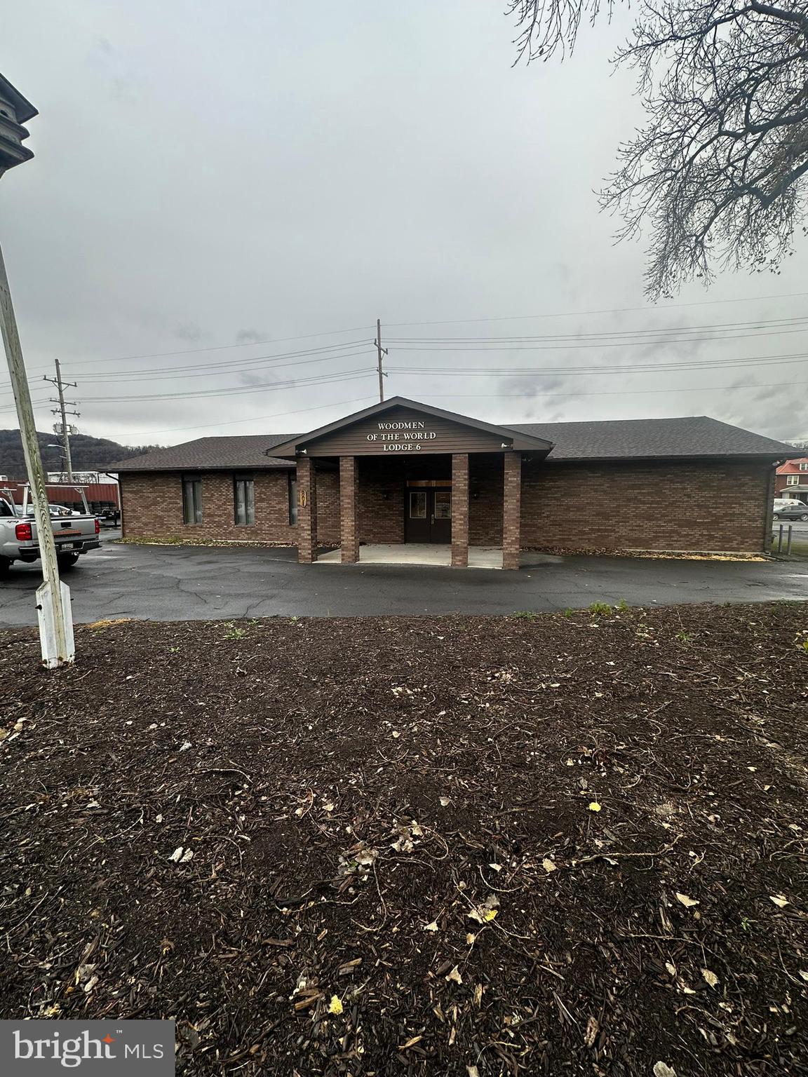 Seller Motivated!!! All brick building 1 owner 1 user 3,200 square feet 40 x 80' high quality built in 1995 lightly used by non-profit Woodmen of the World since they built it. ADA Accessible (1995 codes) Entrance hallways and restrooms. 40 x 40 meeting hall, large kitchen with commercial vent hood/ fire protection. Efficient Gas FWA with central Air (2 systems) LED Lighting Recent roof replacement. 32 Paved Parking Spaces with 4 curb cuts (2 on front 2 on side) Very good condition! As-Is but inspection clauses are welcomed. 3 flagpoles, very big tree. Opposite CSX Railroad Main Cumberland Shops and Yard entrance. Lots of traffic. This would be great for a small religious facility, health care, bar or restaurant, retail, day care, automotive, office, ... Almost all furniture and fixtures could be included at the right price. 40 x 80 with no load bearing walls in most areas.
