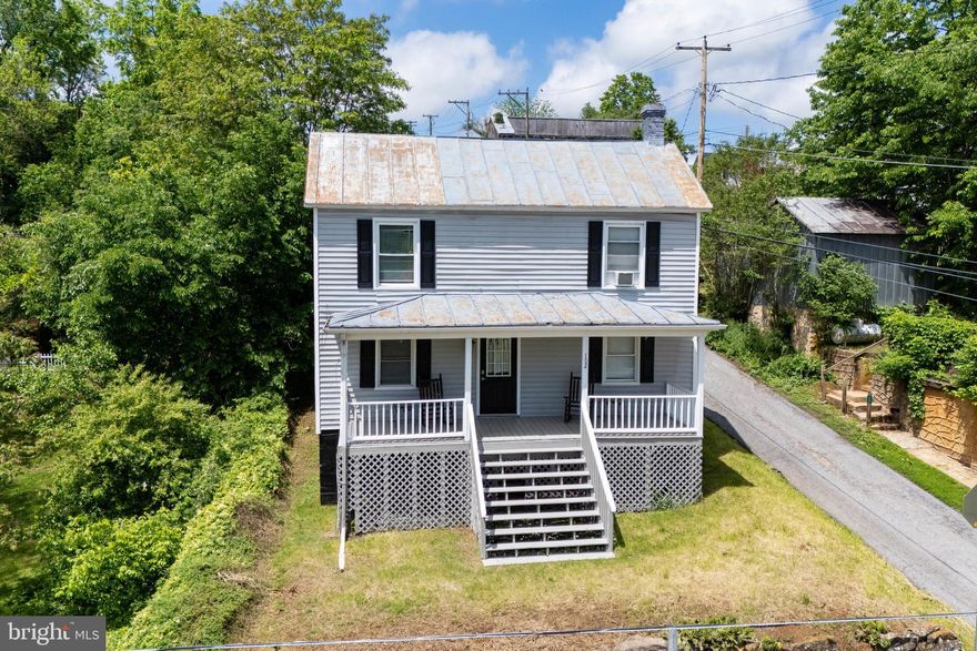 Welcome to 102 South Hawksbill Street in charming Luray, Virginia—an outstanding investment opportunity in a vibrant and growing community. This fully renovated property features two separate one-bedroom, one-bathroom apartments, ideal for investors or those seeking rental income potential.

The main-level unit boasts a beautifully renovated kitchen and bathroom, offering modern style and comfort. Upstairs, you'll find a well-maintained one-bedroom, one-bathroom apartment with its own private appeal.

Additional highlights include two off-street parking spaces located at the rear of the property, providing convenient access for tenants or guests. You'll also enjoy a rare backyard with plenty of space to create your own outdoor oasis—with potential for a fire pit, garden, playground, or entertainment area.

Situated in an ideal location, this property offers easy access to the Luray Greenway, the historic downtown district, and is just moments from restaurants, banks, schools, and other conveniences. Enjoy beautiful mountain views and the strong demand for quality rental housing in this picturesque Shenandoah Valley town.

Don’t miss this opportunity to own a turnkey duplex in one of Luray’s most desirable locations!

Note: Owners are licensed real estate agents.