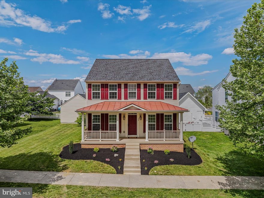 This classic colonial home resides in the much sought after Huntfield neighborhood. The subdivision offers a community park complete with tennis courts, playground, and walking path. The home features 4 bedrooms and 2 and 1/2 bathrooms. When you pull up to the property you are immediately struck by its excellent curb appeal. You have manicured landscaping and a large front porch. This would be a perfect place to enjoy a morning cup of coffee. Inside you have a large foyer with two story ceilings and tons of natural light. The hardwood floors carry throughout the main level. To the left you have the formal living room with beautiful crown molding. To the right of the foyer, you have the spacious dining room with crown molding and exquisite tray ceiling. The kitchen is conveniently located adjacent to the dining room. Here you have a butler's pantry for extra storage. The kitchen features ceramic tile floors for easy clean up. You have medium stained maple shaker style cabinets and recessed lighting.  The stainless-steel appliances include a range with double ovens. This is great for entertaining during the holidays. The peninsula island provides several breakfast bar seats. The kitchen opens to the breakfast room. This space features a large window for lots of sunshine and a decorative light fixture to define the space. Beyond the breakfast nook you have a large family room with hardwood floors, large windows, and ceiling fanlight fixture. In this space you have a convenient half bath with pedestal sink. You also have a large laundry room with ample shelving storage and laundry sink. Hardwood stairs lead you to the hardwood landing on the upper level. You have three generously sized bedrooms with carpet and ceiling fan. The hall bath features a single bowl vanity and tub/shower with tile surround. The primary suite bedroom features vaulted carpet and vaulted ceiling with ceiling fan. The entrance to your ensuite bathroom is flanked by TWO walk-in closets. Wow! The large primary bathroom features ceramic tile floors, a 4 ft soaking tub and 5 ft shower with glass doors and large seat. The 6 foot double vanity affords you ample storage space. The separate water closet provides extra privacy. The owners of the home will want for nothing in this oasis of a primary suite. The lower level of the home is mostly finished. It includes a huge rec room with carpet and recessed lighting. This space features an egress window. So, it could be used as a 5th bedroom is needed. Bonus room downstairs could be a great theater room or home office space. There is a gym with padded floors, mirrors, a storage closet, and track lighting. The unfinished area is presently used for storage but contains a rough in for a full bath for future expansion. In the rear of the home, you have a large, covered porch with a concrete patio. This provides a walkway to the spacious, detached 2 car garage. The yard is fully fenced with gates in the front and rear of the home. It's ready for your pups to enjoy. This property has everything you've been looking for with many added bonuses. It won't last long; schedule your appointment today!