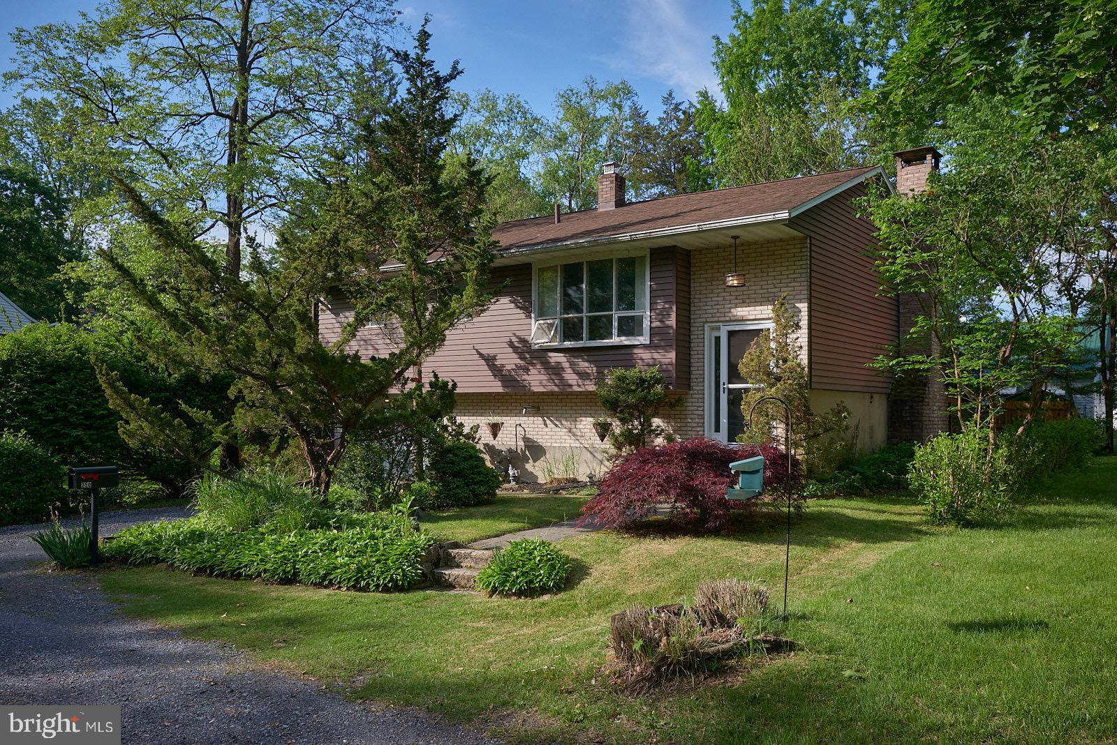 Welcome to 250 Taft Avenue, a charming and well-maintained home in the desirable Exeter Township School District. Full of character, this property offers a private backyard oasis featuring a covered patio, attached greenhouse, and beautifully landscaped grounds. The upgraded kitchen adds modern appeal, while recent updates like the newer garage door, HVAC system and hot water heater ensure comfort and efficiency. Included with the home is the adjoining lot which includes a large green space area, a garden, shed, and an oversized one-car garage—perfect for extra storage or a workshop. This is a truly special property with space, style, and convenience.