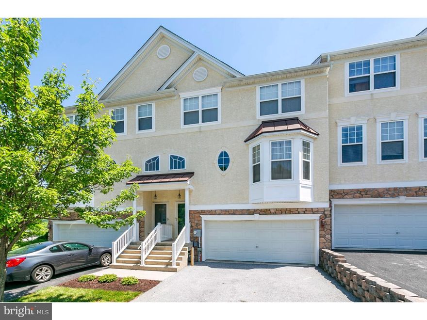 Street lights and sidewalks give this walkable neighborhood that community feeling. You'll love this bright and airy home with enhanced living spaces. From the covered front porch entry you can access the main floor. Big windows and a gas fireplace in the living room make this an inviting place to entertain or relax. Sliders open onto a Trex deck, the perfect spot for a summer barbecue. The open concept great room with kitchen and breakfast bar, dining area and family room is a great feature. Head on upstairs to the master bedroom suite with private bath, two additional bedrooms serviced by a hall bath and a convenient laundry room. The finished lower level expands your living space with another family room, playroom or office. And don't forget the new stuff! NEW microwave, dishwasher and stove. NEW carpeting and upgraded padding. This home has been pre inspected and is move in ready! Walk to the SEPTA commuter train station. Lots of restaurants and great shopping nearby. This one is the real deal!