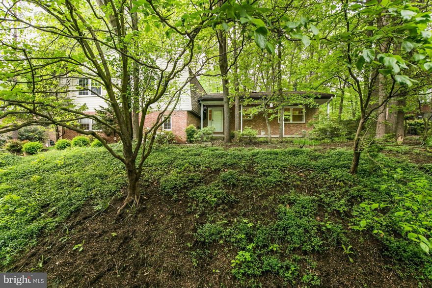 Charming brick & hardie plank (2008) home w/terrific space throughout!  Large table-space kitchen w/bay window & skylight.  DR & LR w/hardwoods. Large, two-tiered deck off of DR. All 4 BRs on UL have 3/4" oak hardwoods under carpet. Remodeled UL & LL hall baths (2016). Family room w/brick FP. Great storage. Newer windows throughout (2008).  New Carrier AC (2010). Close to schools, metro, trails.