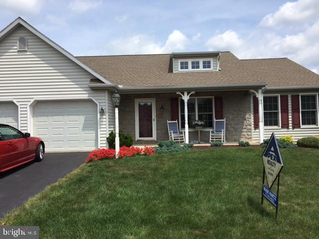 Immaculate home with Open Floor plan and vaulted ceilings, Large sunroom, family room in basement as well as Shop with outside entrance