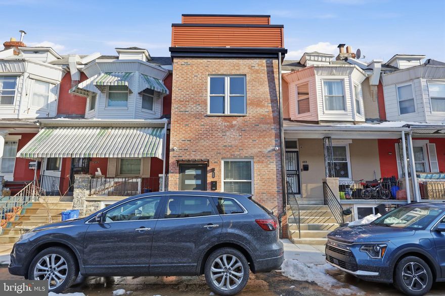 Welcome to 458 W Earlham Terrace, a newly constructed townhome presented by a local boutique builder, offering over 1,815 sq. ft. of thoughtfully designed living space paired with modern luxury finishes throughout. Step inside to soaring 9’+ ceilings and a sun-drenched living room that immediately sets a warm, inviting tone. The open-concept main level flows effortlessly, highlighted by engineered hardwood flooring that enhances both style and functionality. The gourmet kitchen is truly the heart of the home — designed for both everyday living and entertaining — featuring: Stainless steel appliances, Quartz countertops, Contemporary designer backsplash, Classic white shaker cabinetry, Pantry closet and dedicated wine & coffee station with built-in wine fridge.  The second level offers two generously sized bedrooms, a full hall bathroom complete with soaking tub, and a convenient laundry area equipped with front-load washer and dryer. Occupying the entire third floor, the primary suite serves as a private sanctuary. This retreat features: Private balcony off the bedroom, Oversized walk-in closet, Luxurious en-suite bath with dual vanity, Private toilet room  and frameless glass walk-in shower.  Outdoor living is equally enjoyable with a fully fenced rear yard, ideal for relaxing or entertaining guests. Additional highlights include: Tankless hot water heater, New HVAC system and Fire sprinkler system.  Perfectly positioned just blocks from the vibrant Germantown Avenue commercial corridor, residents enjoy convenient access to Chestnut Hill, Center City, major transportation routes, and Fairmount Park. Experience the very best of Germantown — a neighborhood celebrated for its historic architecture, cultural diversity, and strong sense of community.