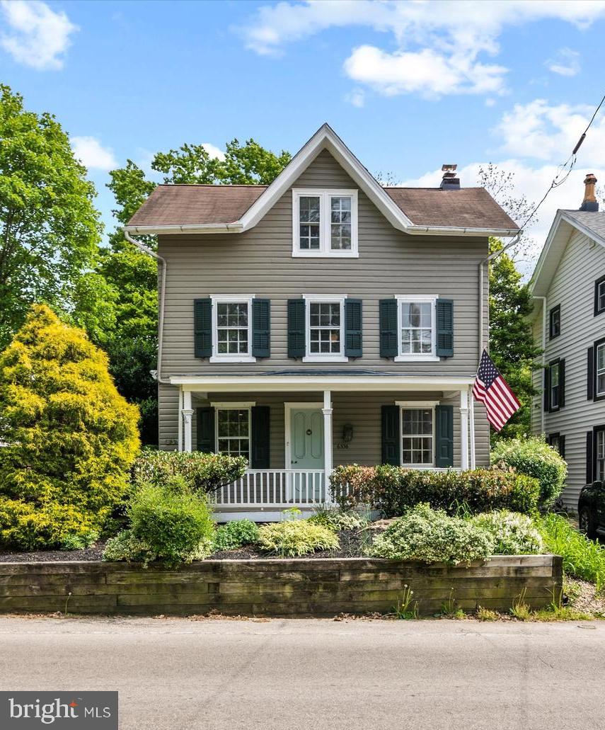Welcome to one of the most charming and well-loved homes in Flourtown! Come see for yourself how this historic house delightfully blends the old with the new. Built in 1840, then added onto first in 1850 and then in 1955, with a lovely 20th century addition, 6336 E. Valley Green Road is both old-world charm and modern living through a wonderful blend of architectural details.
Pull into the driveway (holds up to 3 cars) and enter into a multi-purpose mudroom that leads into a warm dining room with wood beams and fireplace (chimney now sealed). To the right of the dining room is a spacious living room at the front of the house with built-ins and access to the front porch. To the left of the dining room is the high functioning galley kitchen that looks into a large, bright family room with wood-burning fireplace, half bathroom and a door that opens out to the patio. The other end of the kitchen leads to a laundry room with stacked washer/dryer, built-in cabinetry and additional back patio door.
The 2nd floor is reached by a stairway in the back of the dining room. At the top of the stairs, to the right, is the Main bedroom with original beams, built-in closet/shelving, and a recently renovated bathroom with new floor, new sink cabinet, new toilet and shower over tub. Across the hall are 2 more light-filled bedrooms that share the hall full bathroom with new sink cabinet and lots of newer plumbing. Up the stairs to the 3rd Floor you will find 2 more bedrooms that are currently being used as a workout room and office. There is an unfinished basement for utilities, work area and storage, new windows. Crawl space under 1955 addition. Gas boiler (2014). 2 separate central air conditioning air handlers, one in basement, one in attic. Brand new 50 gallon gas domestic hot water heater. 200 AMP electric service with circuit breakers. Copper water service line to the street. Things to take note of: Absolutely stunning random width red southern pine floors; Electric heat in the family room; 19th century clapboard siding in wonderful condition. Sellers willing to sell 2nd & 3rd floor furniture, including beds. Fully fenced rear yard with private rear patio with new underground drainage and small shed. Off-street parking for 3 cars. Attractive location close to Flourtown restaurants and shops. The #94 SEPTA bus is down the street on Bethlehem Pike. A short walk to Fort Washington State Park or short drive to Chestnut Hill or Blue Bell resources or to Rte 309 Expressway and PA turnpike or enjoy the splendor and birdsong of the beautiful back yard.