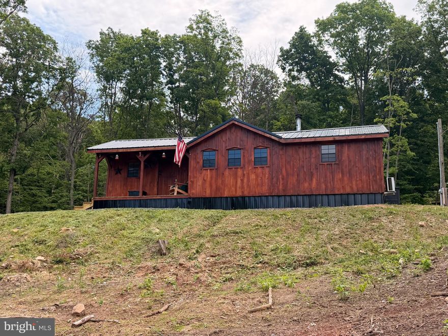 Welcome to this cozy little honey dew hideout, custom built by the amish...take time out of your busy schedule to check out this cute cabin situated on almost 6 unrestricted acres.  Pack your suitcase, load the toys and grab some food from the store. That is all you will need...Seller is leaving everything, right down to the silverware.  Everything conveys, (excluding personal items and firearms). Most of everything is new, the septic system, mini splits, there are (2) of them that cools and heats, which is more than enough. The 14,500 generator which is housed in a close sealed container, LG washer and dryer combo. 2 smart TV's, 75 inch and a 65 inch, all the furniture and a brand-new gazebo still in the box. So many items that remain with this cabin that can be yours.  A 12 x 24 garage tent for your toys and a 10 x 10 shed to keep all the other items in, like the chainsaw, air compressor, gun safe, power tools, etc...  Seller also had a private road installed for better access to your next getaway or your air bnb investment.... OH, and the internet and phone service is absolutely the best...This perfect place is MOVE IN READY!  ACT NOW..