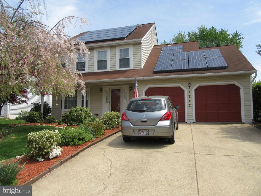 OPEN 5/26 Sunday 11 to 1 pm This two story colonial has plenty of living space. 3 to 4 bedrooms and 2 and half baths. The upper level loft could be a 4th bedroom . The kitchen is located near the family room that has skylights  and a great view of a large landscaped rear yard. The 20 x 15 deck is additional space for outdoor entertaining. A fish pond with waterfall next to deck makes the evening relaxing. The house has  a full basement that is partially finished. Its waiting for you to make it your game room etc. Lawn equipment in the huge two car garage conveys. There is a parking pad for two additional vehicles. Make your appointment today. You will not be disappointed.