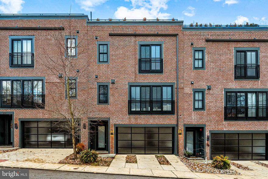 Look no further and move right into this fabulous, sun-filled residence in the center of Downtown Wayne. Incredible industrial chic design elements and timeless modern materials are showcased throughout by renowned builder Weiss and Associates. Endless features include bright freshly painted neutral decor,  soaring ceilings, open staircases,  exposed brick walls, large warehouse-style windows, a wonderful open floor plan, breathtaking chef's kitchen with Thermador and glass Subzero appliances, AGA range hood, generous pantry with custom shelving, wet bar with smoked glass leathered quartzite countertops, gas fireplace in the great room, primary bedroom suite with 2 customized walk-in closets, 2 additional spacious bedroom suites, with customized walk-in closets,  incredible private roof top deck offering relaxing outdoor living space with beach house-worthy wood flooring and gas firepit and elevator-ready shaft space. Tucked back off of the main commuting arteries, this one of a kind home is just blocks from renowned schools, shopping, trains, a plentitude of wonderful restaurants, recreational facilities, clubs and more!